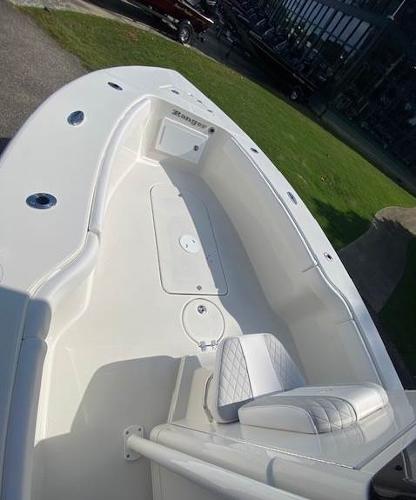 2024 Ranger 2600 Bay boat, white interior, spacious deck, modern design.
