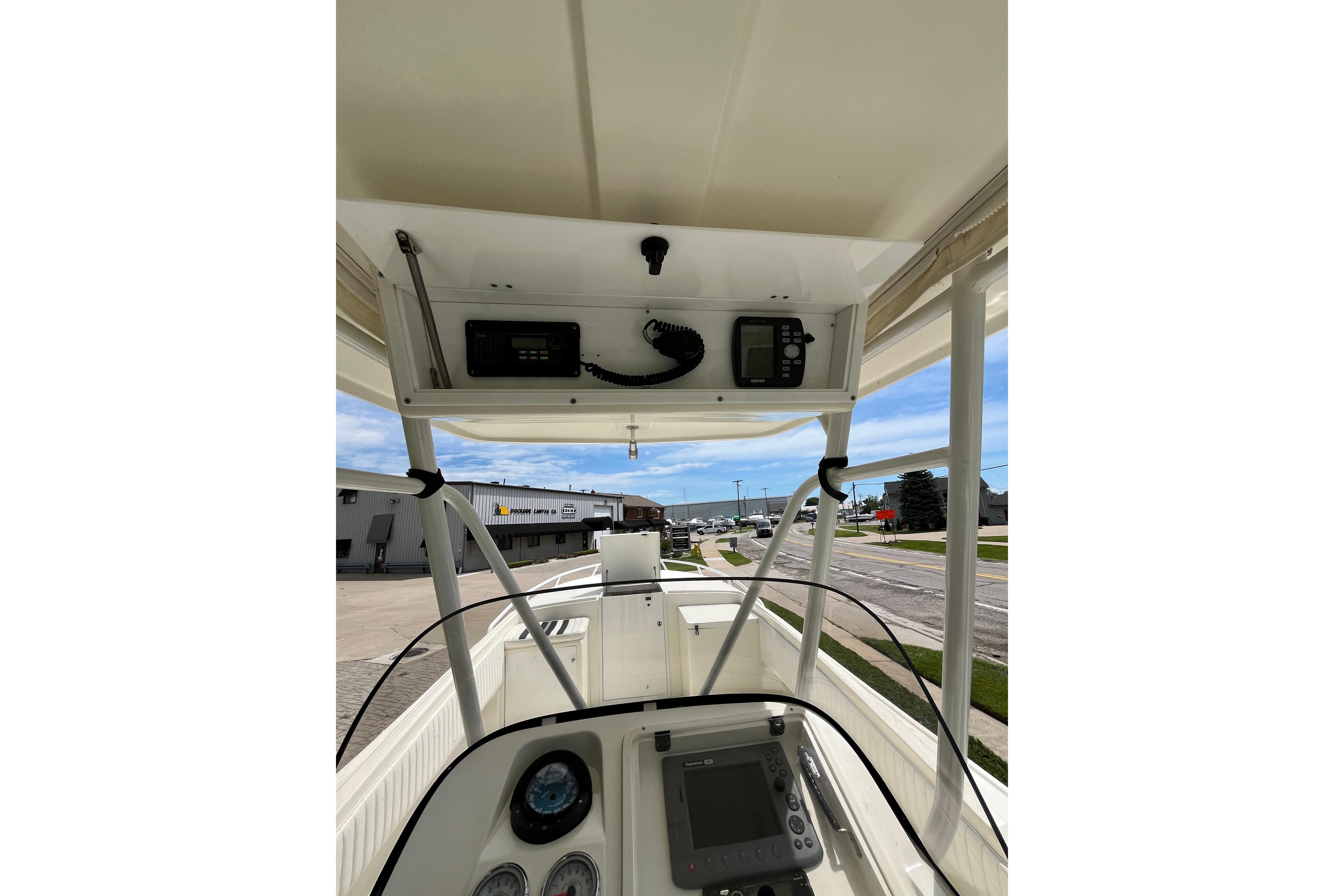 1994 Intrepid 30 Open Cuddy boat dashboard with navigation equipment and controls.