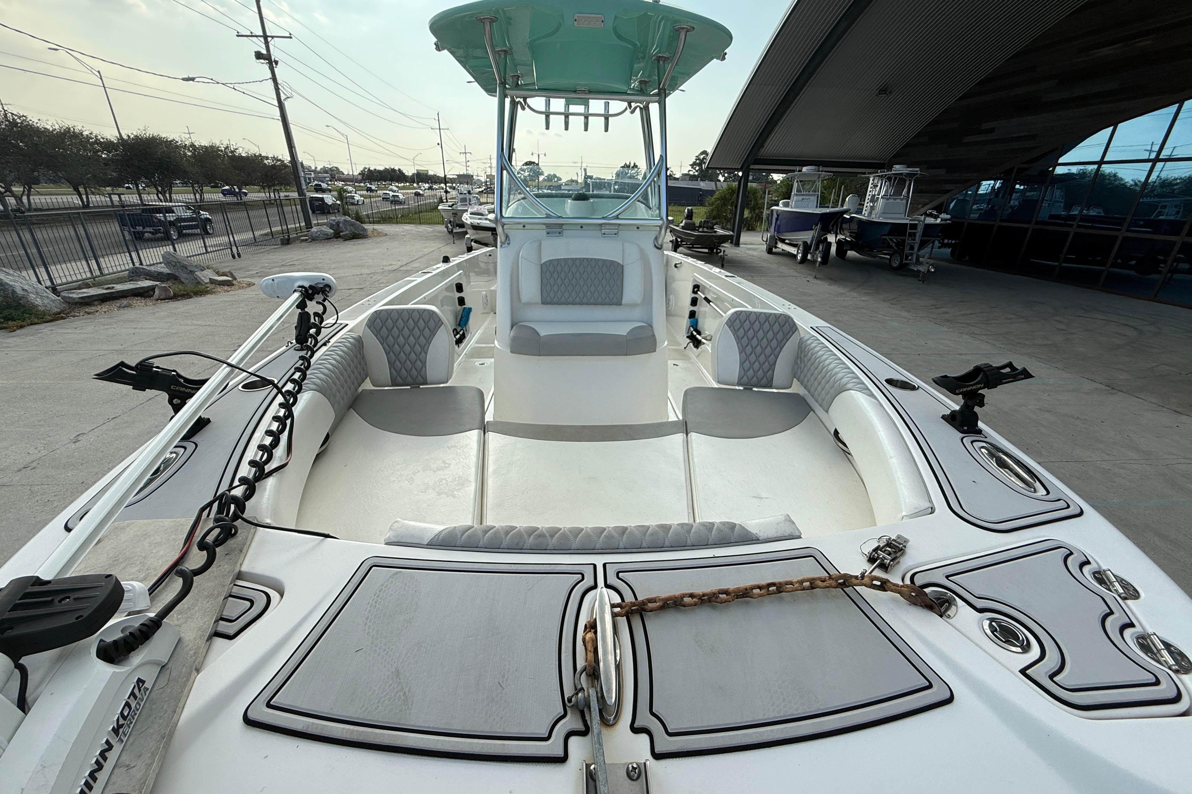 2020 Twin Vee 240 GFX CC boat interior with seating and fishing equipment.
