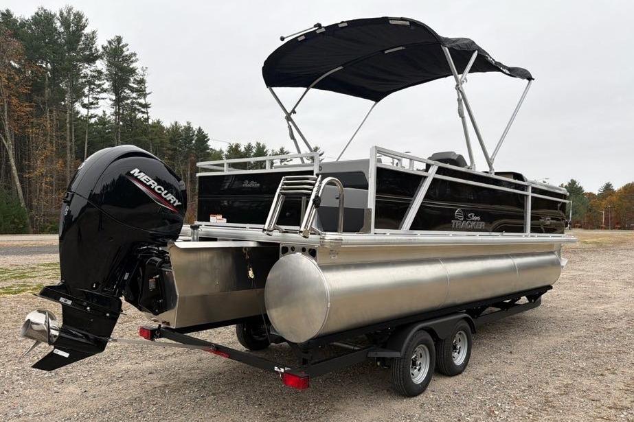 2026 Sun Tracker Party Barge 22 RF XP3 pontoon boat with Mercury outboard motor.