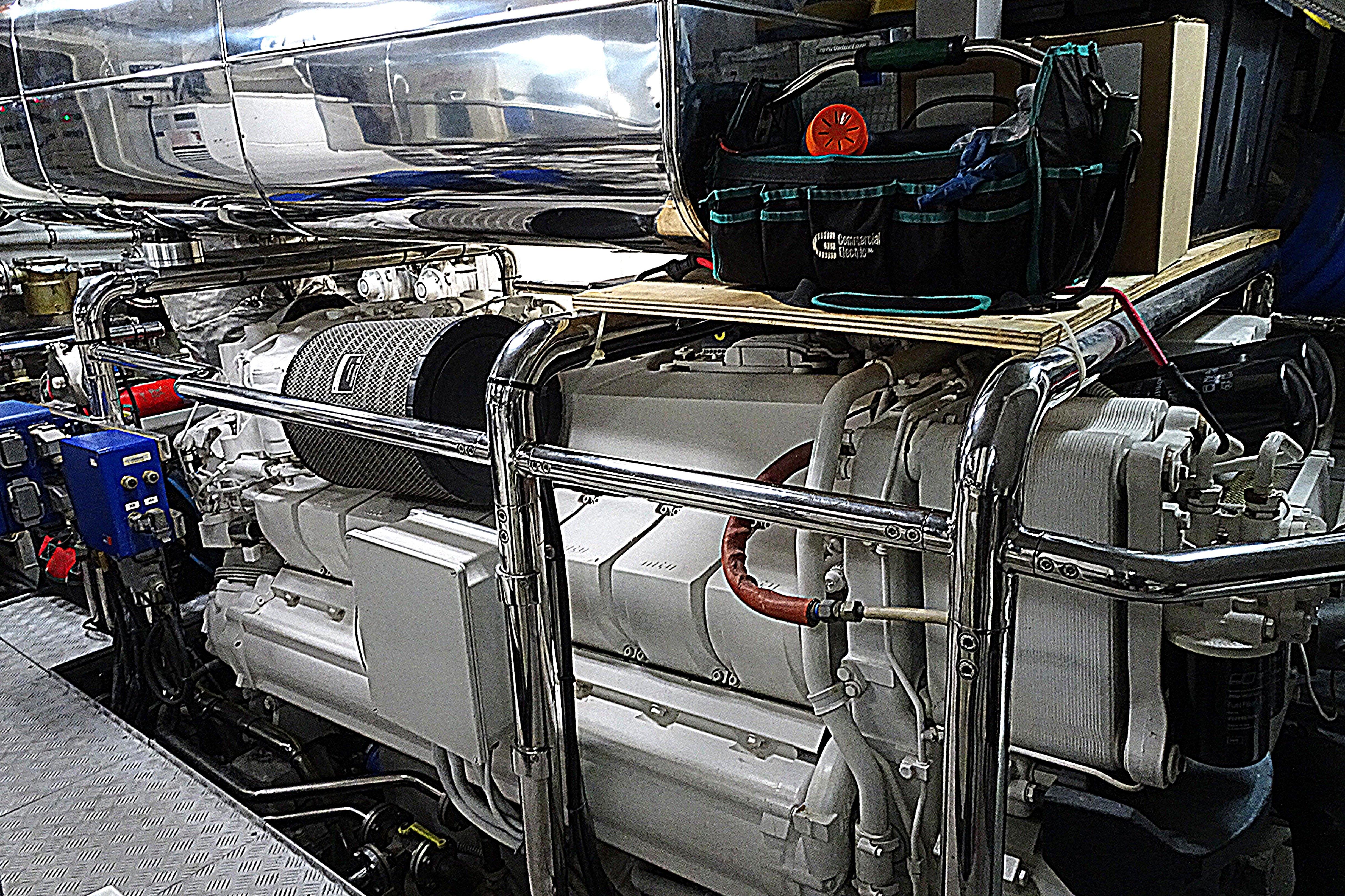 Engine room of 2010 Azimut 100 Leonardo yacht, showcasing machinery and equipment.