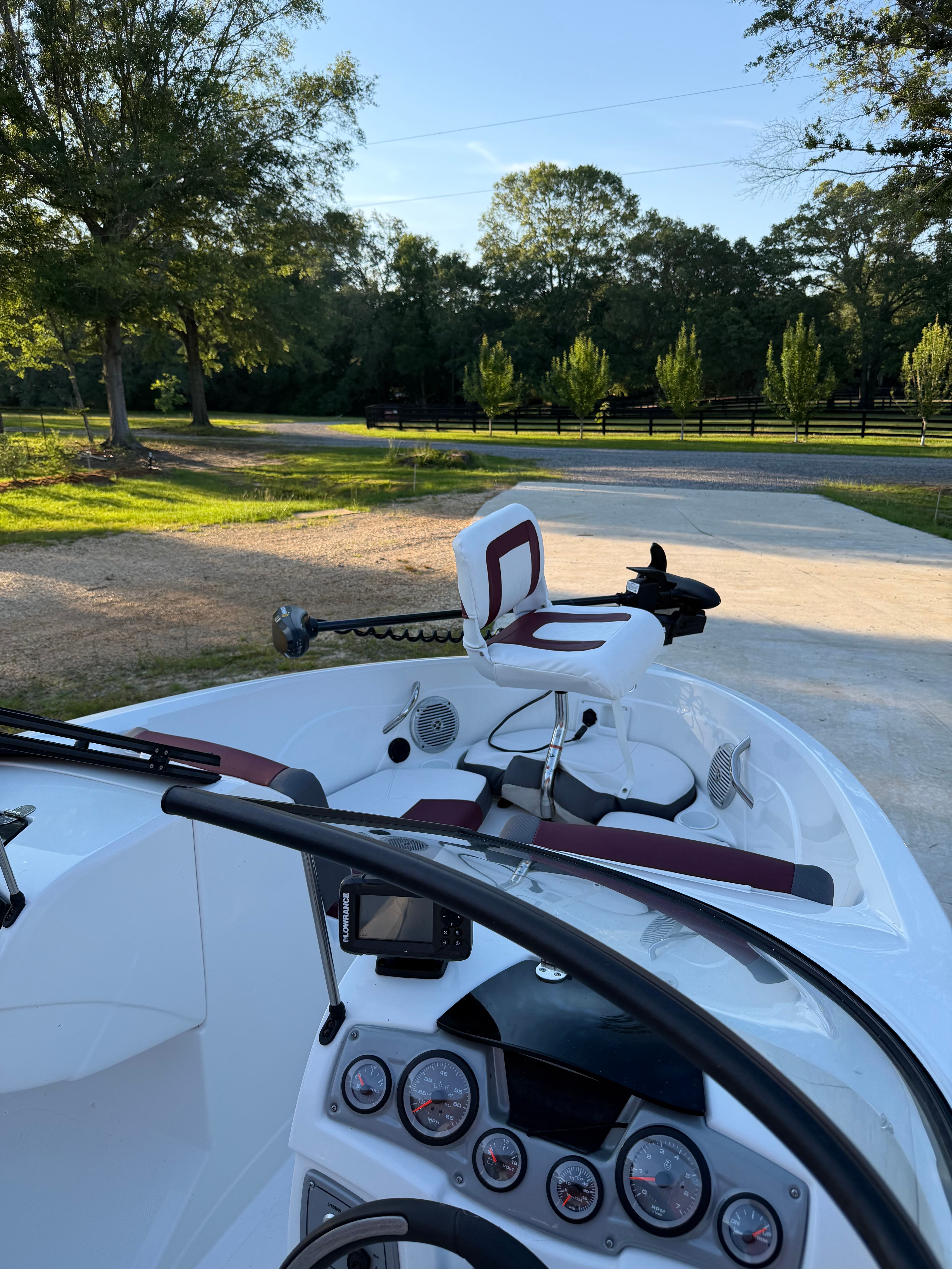 2020 Tracker Tahoe 550TF boat with console and seat.