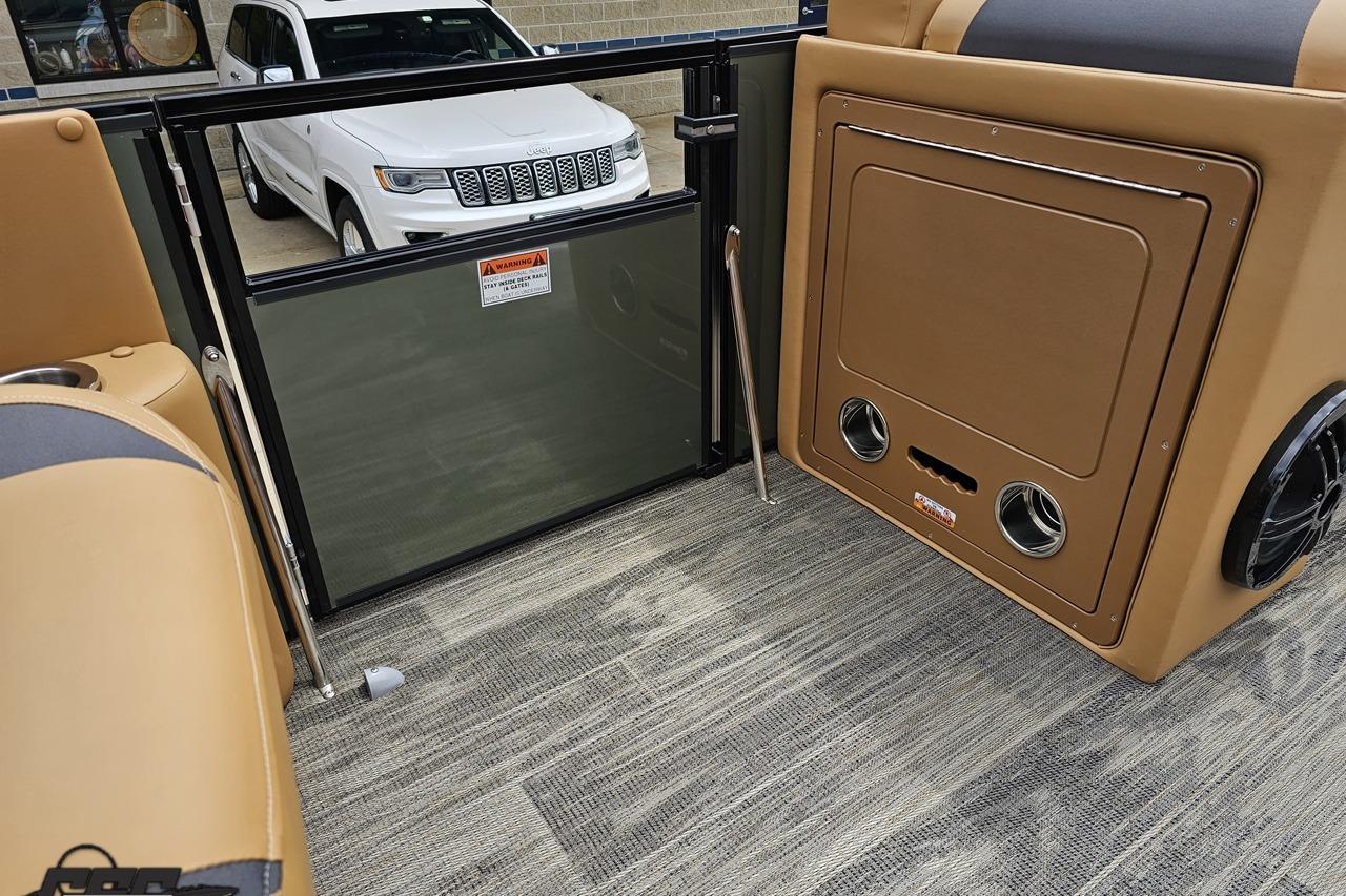 Interior of 2026 Landau Signature 25C boat with tan seating and modern design.