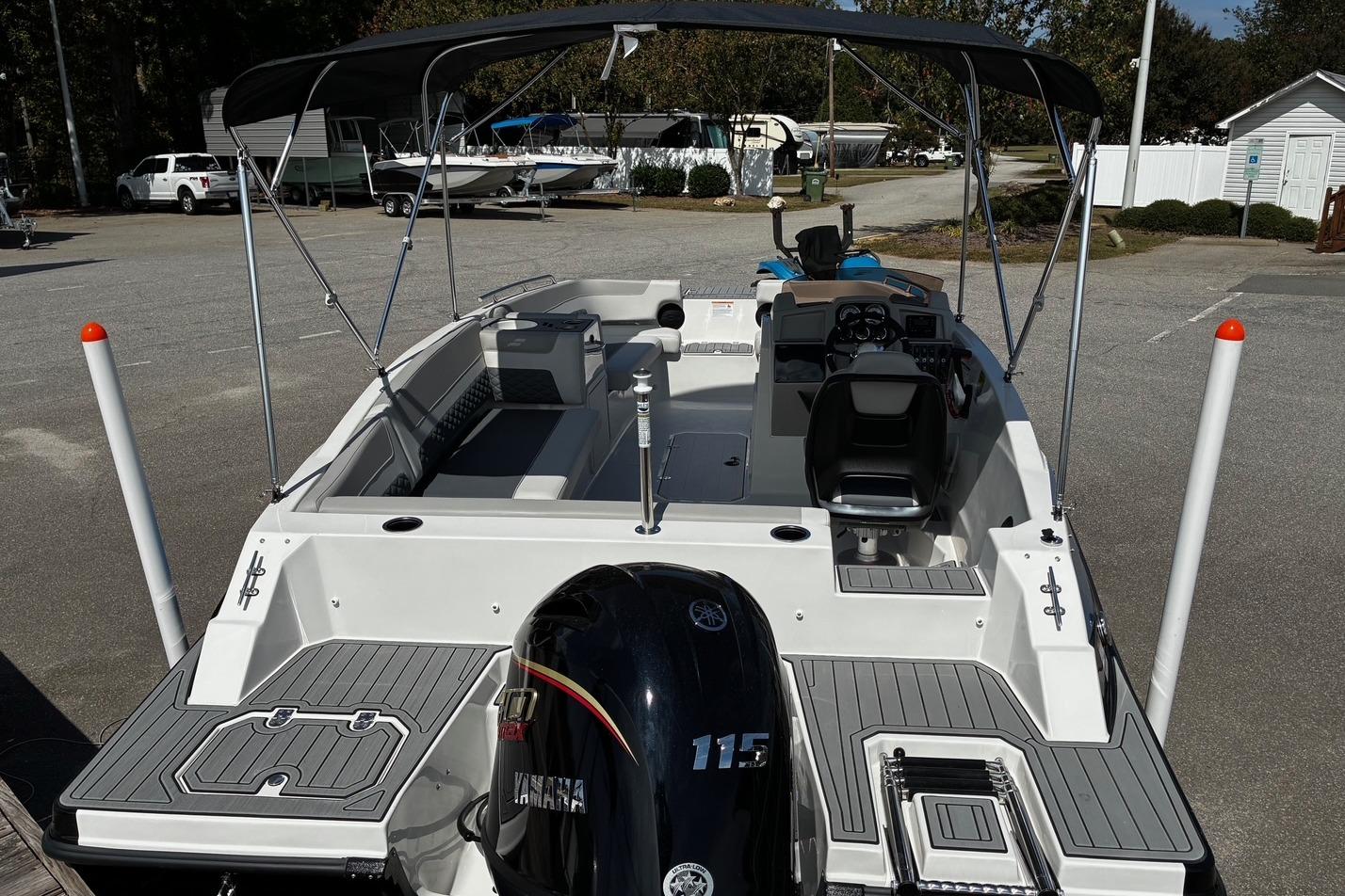 2026 Starcraft SVX 191 OB boat with Yamaha engine, featuring spacious seating and canopy.