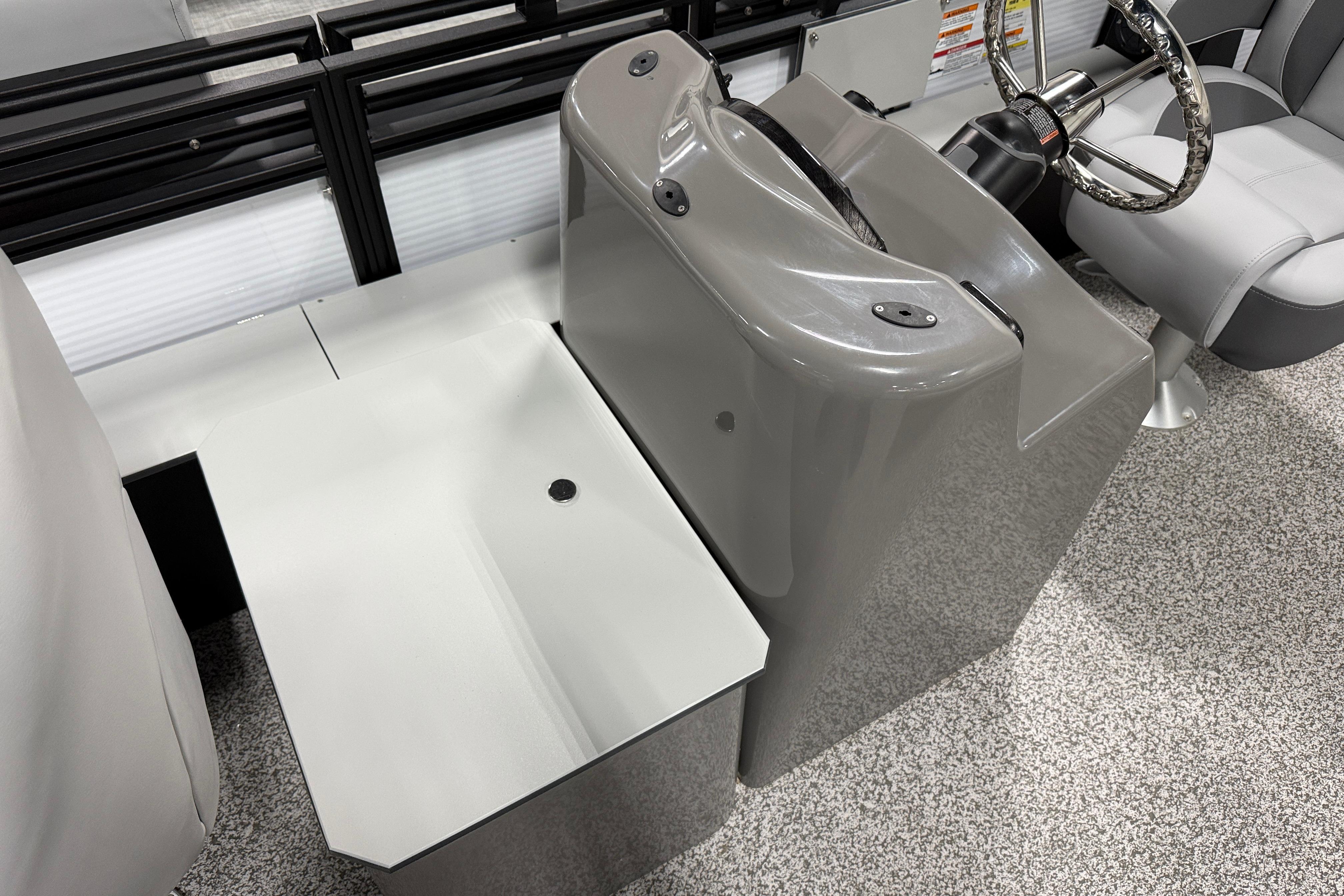 2026 Angler Quest 816 Panfish boat interior with sleek console and comfortable seating.
