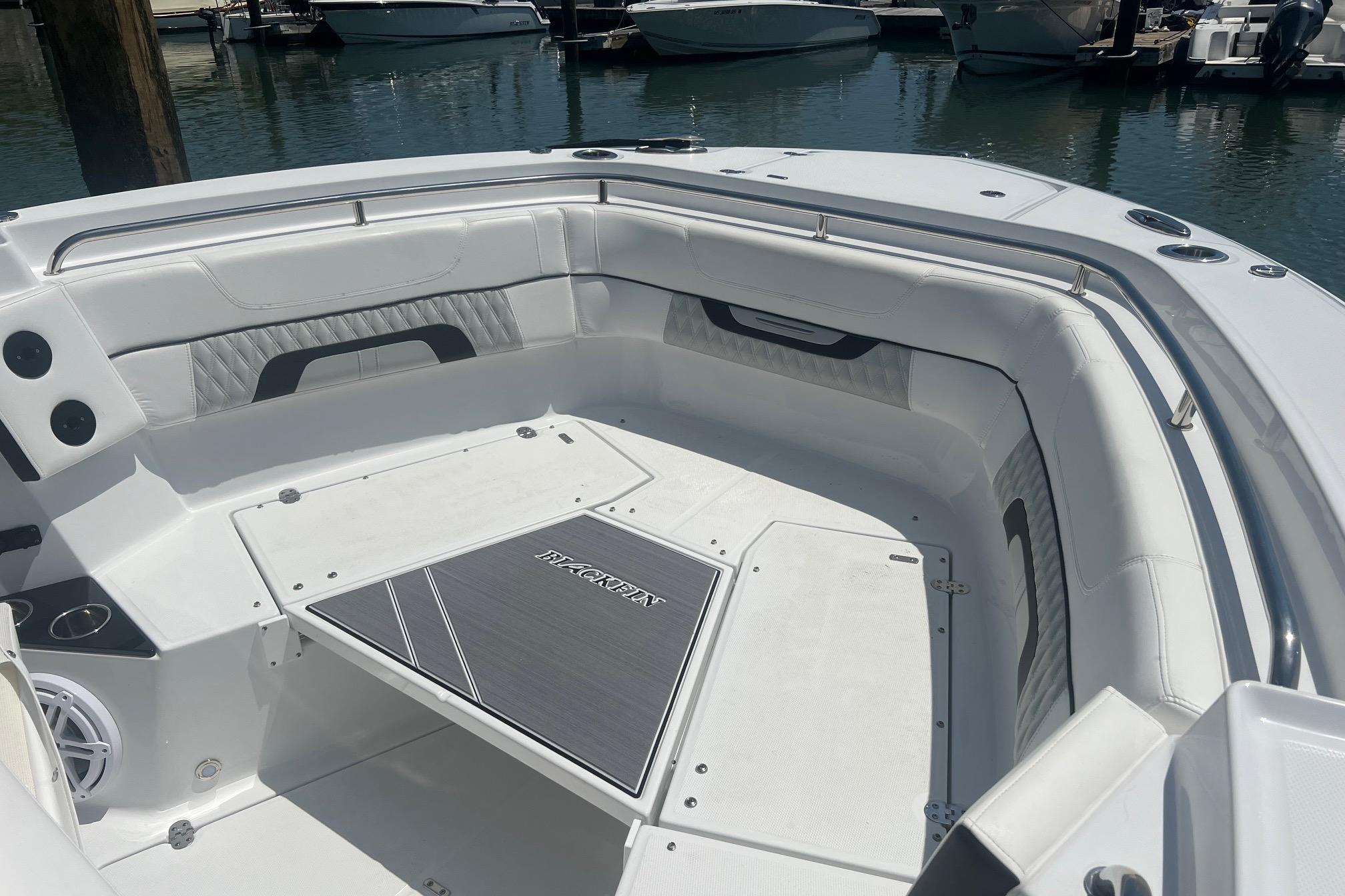 2023 Blackfin 302 CC boat interior with spacious seating and sleek design.