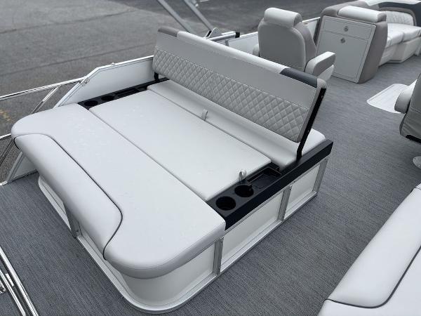 2025 Godfrey SWEETWATER 2286 SFL boat interior with luxurious seating and cup holders.