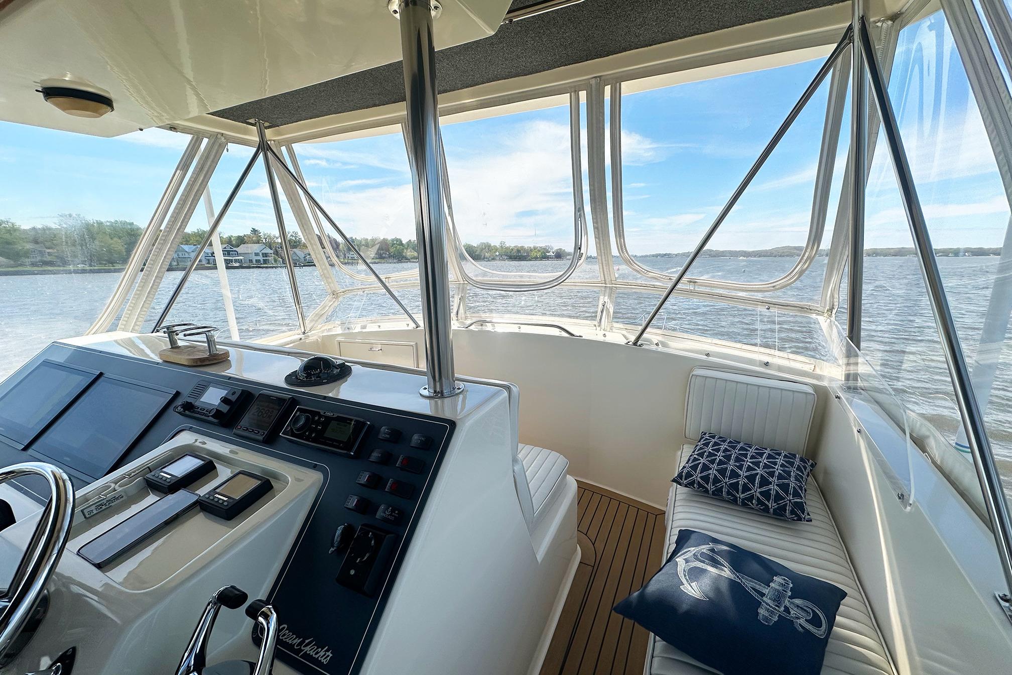 Cockpit view of 1988 Ocean Yachts 48 Super Sport, featuring helm and seating area.