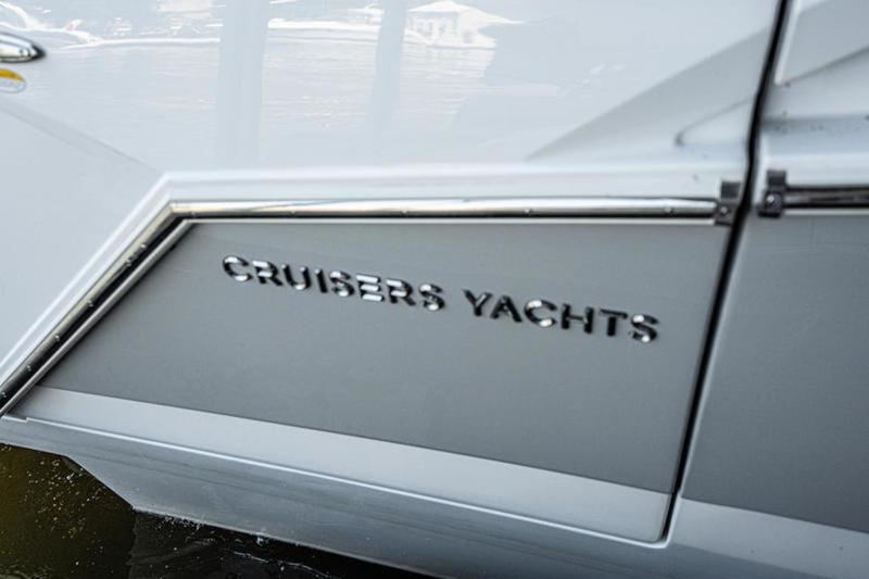 2022 Cruisers 42 GLS yacht side view with logo detail.