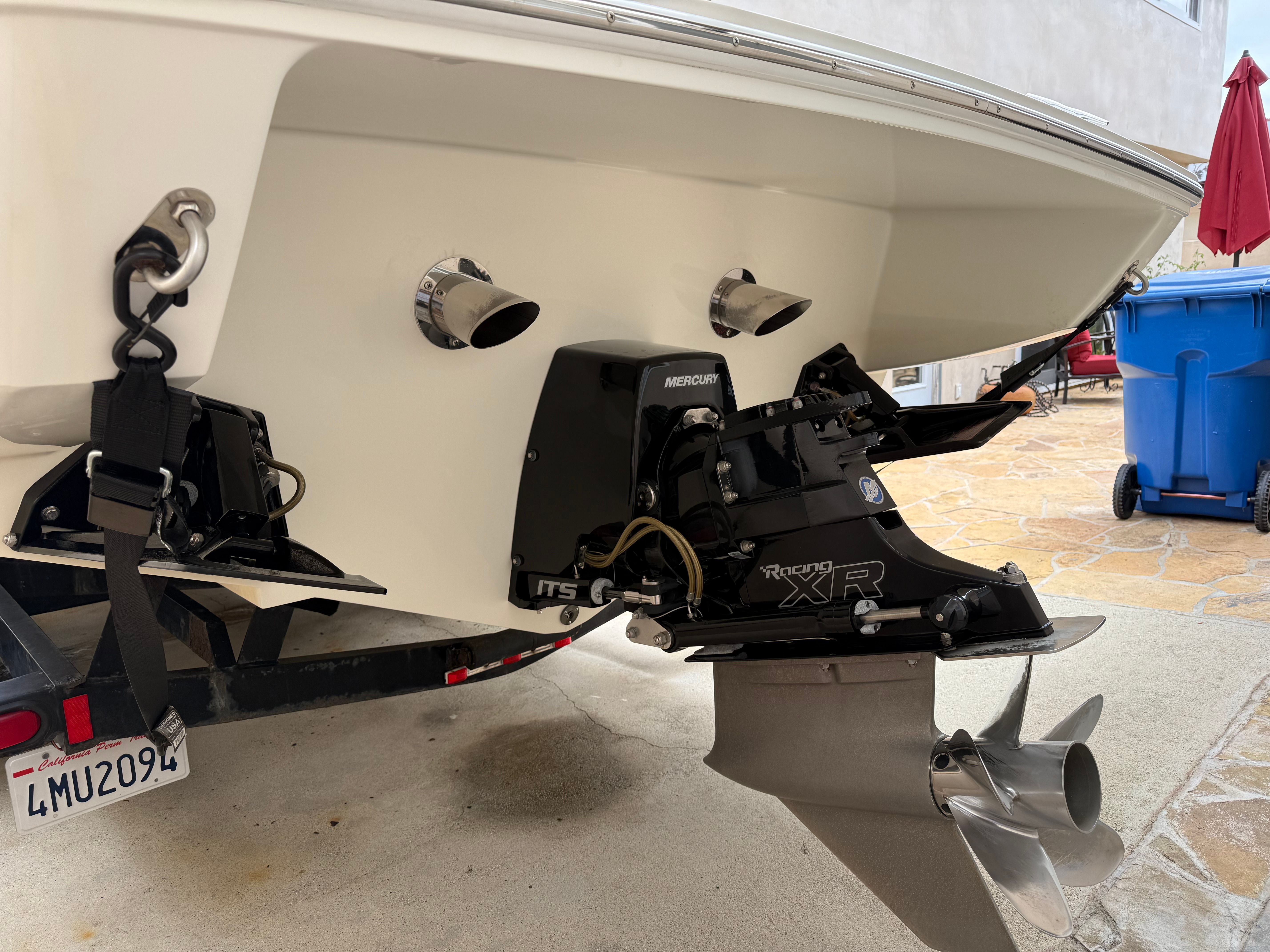 Rear view of a 2001 Wellcraft 29 Scarab boat with Mercury Racing XR drive.