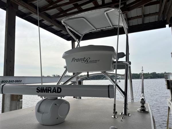 2020 Front Runner 39 Center Console boat docked, featuring Simrad radar equipment.
