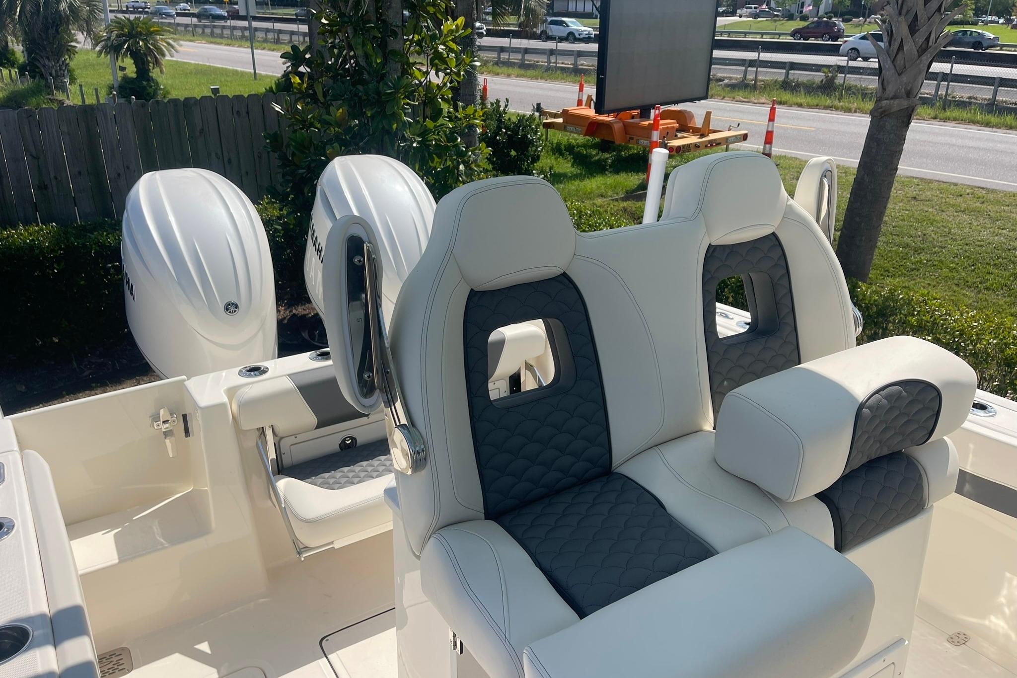 2026 Pioneer 250 Pelagic boat with dual Yamaha engines and luxurious seating.