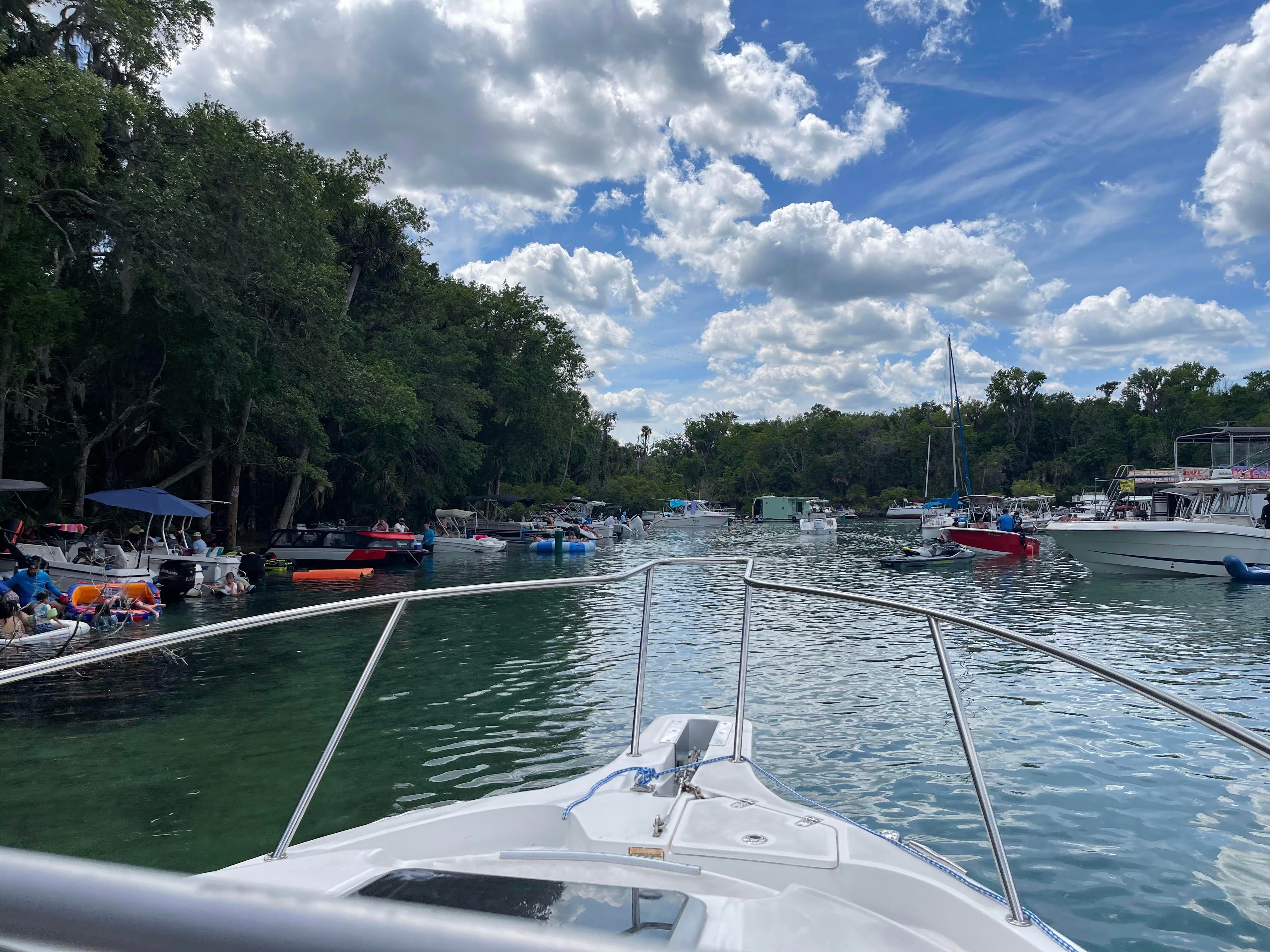 Boston Whaler 235 Conquest on a busy river, 2010 model.