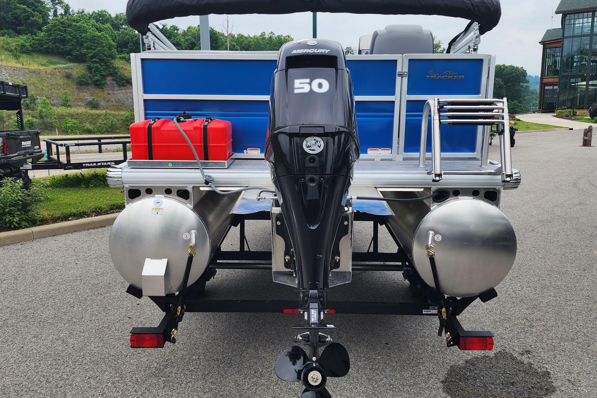 2026 Sun Tracker Party Barge 16 DLX with Mercury 50 engine, rear view.