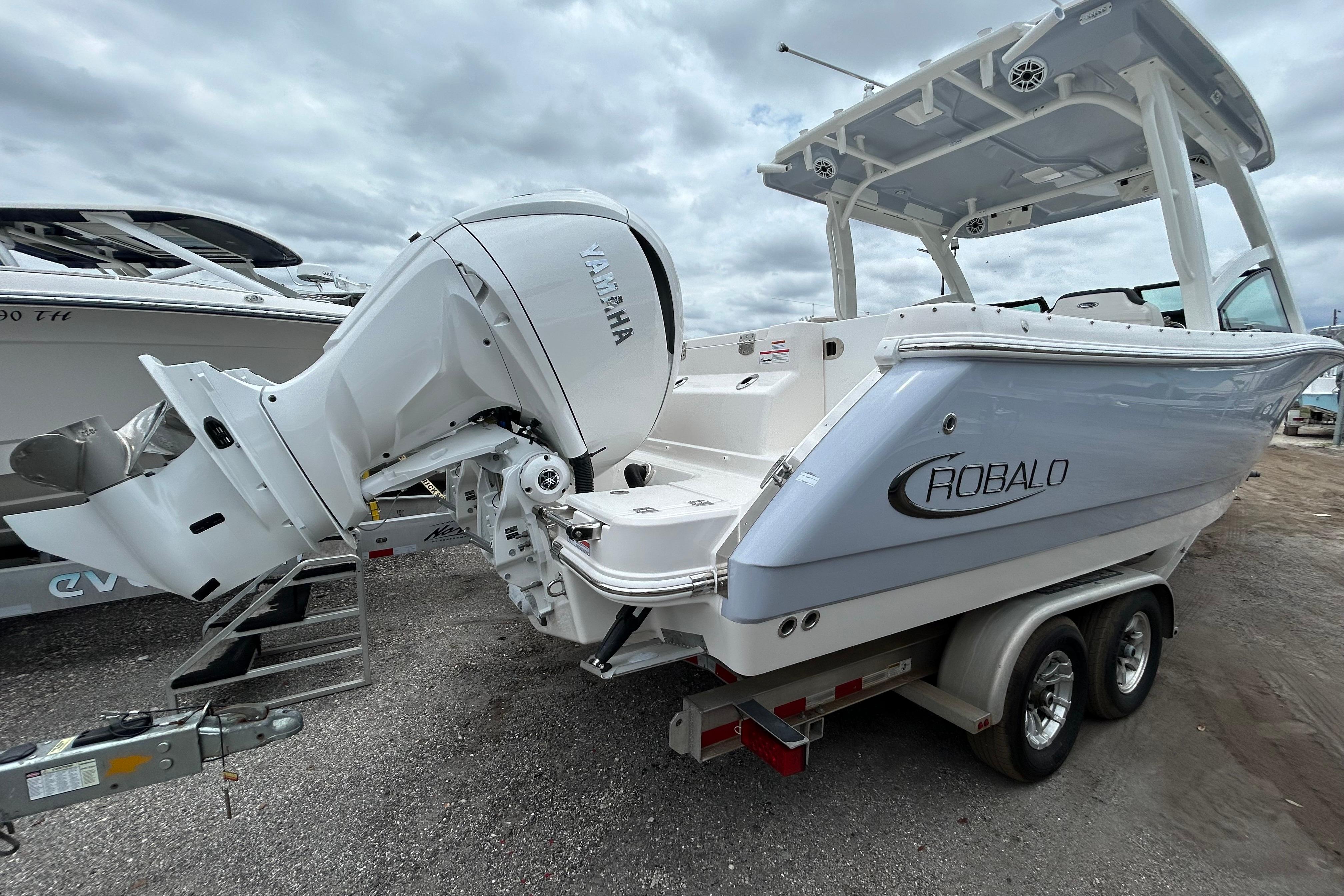 2026 Robalo R277 Dual Console boat with Yamaha engine on trailer.