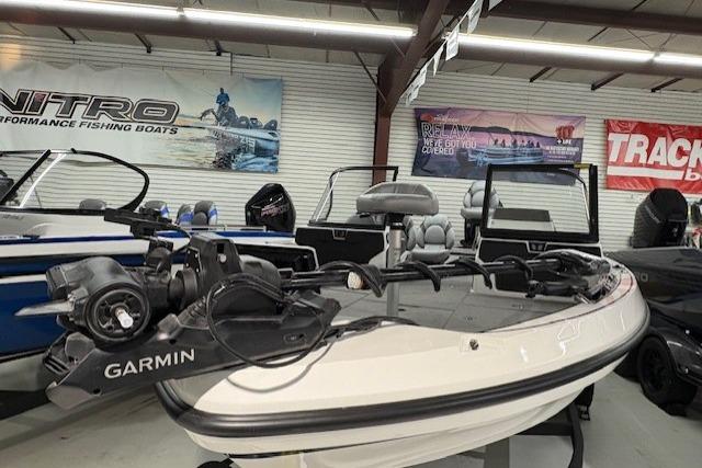 2026 Nitro ZV20 Sport Pro fishing boat with Garmin equipment in showroom.
