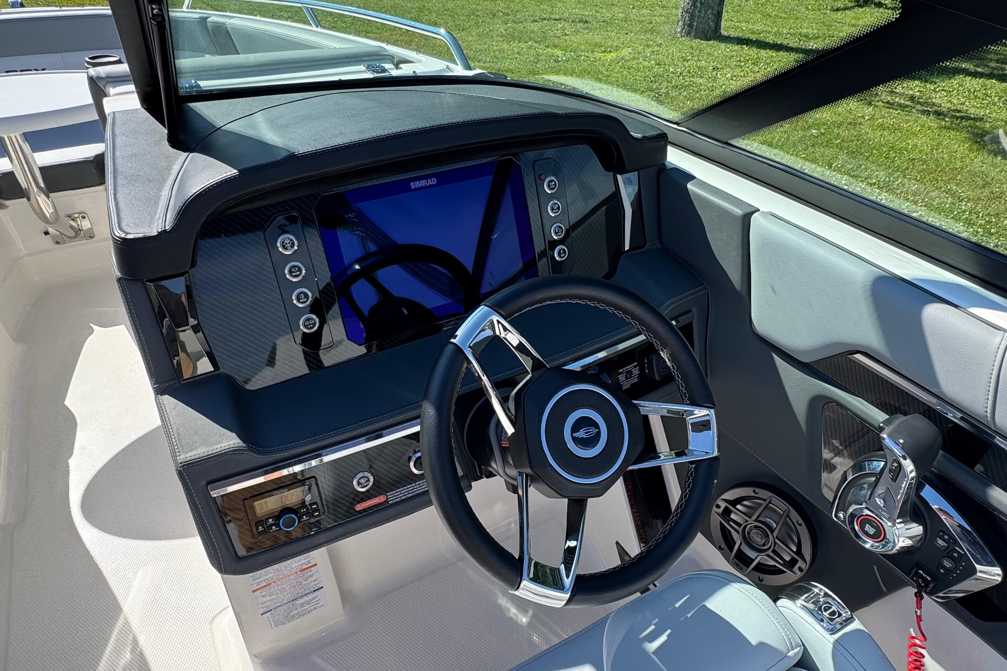 2026 Chaparral SSX 4 boat dashboard with modern steering and control panel.