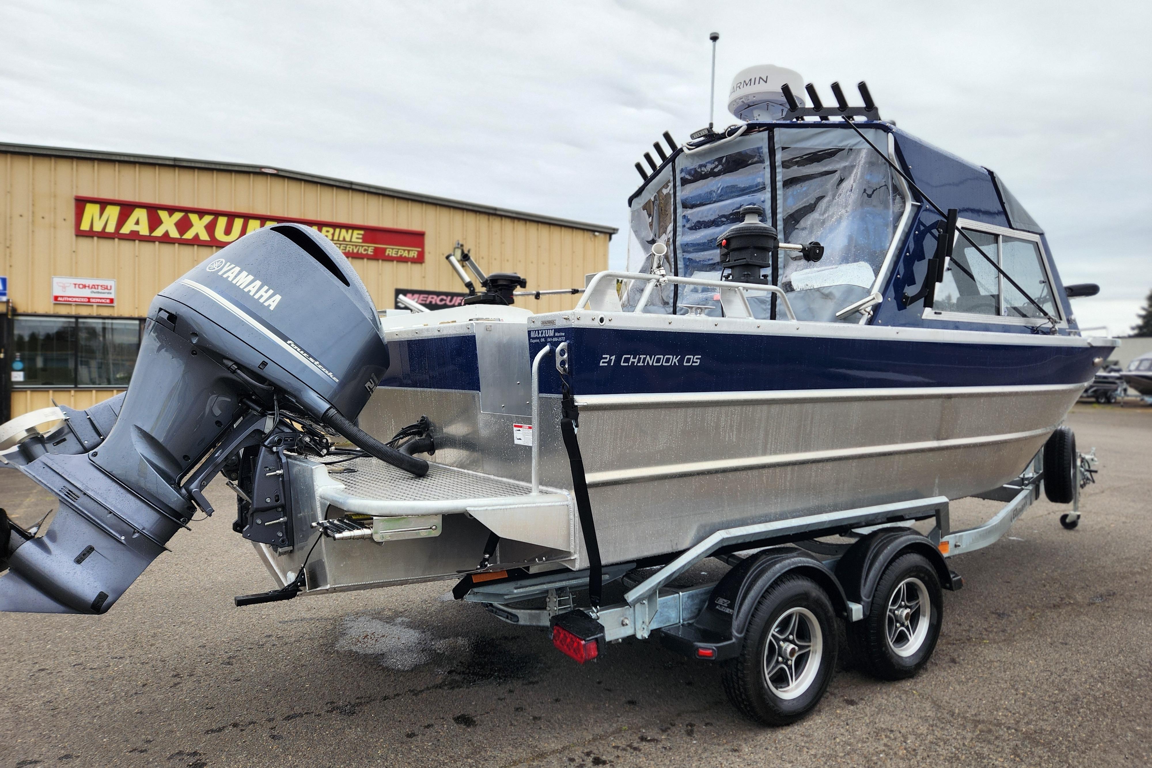 2025 Thunder Jet 21 Chinook OS boat with Yamaha engine on trailer, parked outside Maxxum Marine.