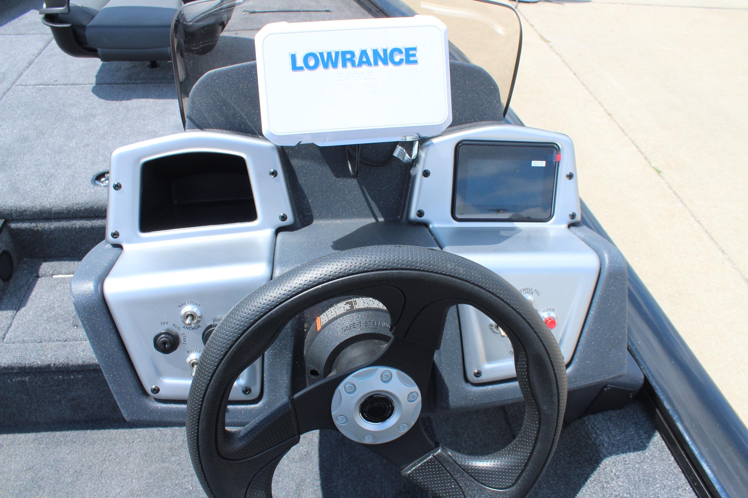 Steering console of 2026 Tracker Pro Team 175 boat with Lowrance display.
