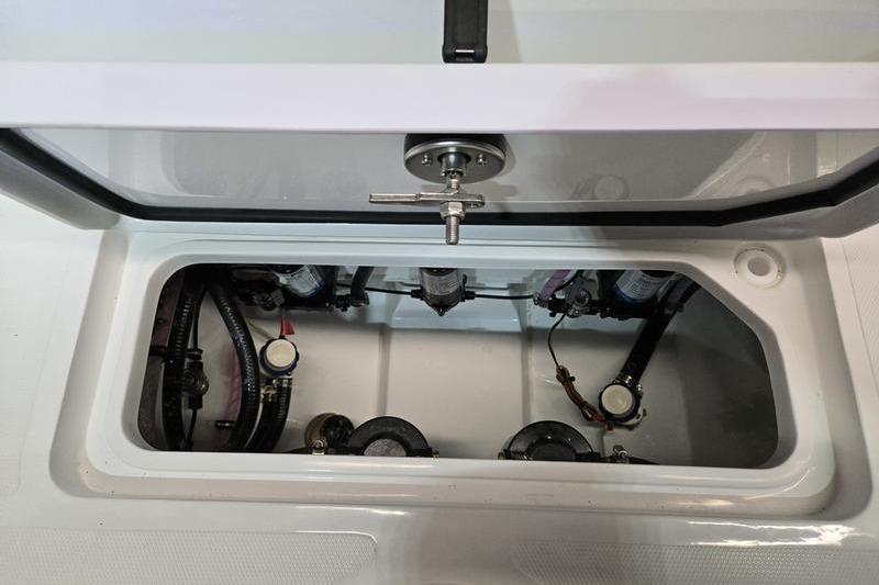 2026 Sea Hunt Ultra 275 Coffin Box interior with visible components and wiring.