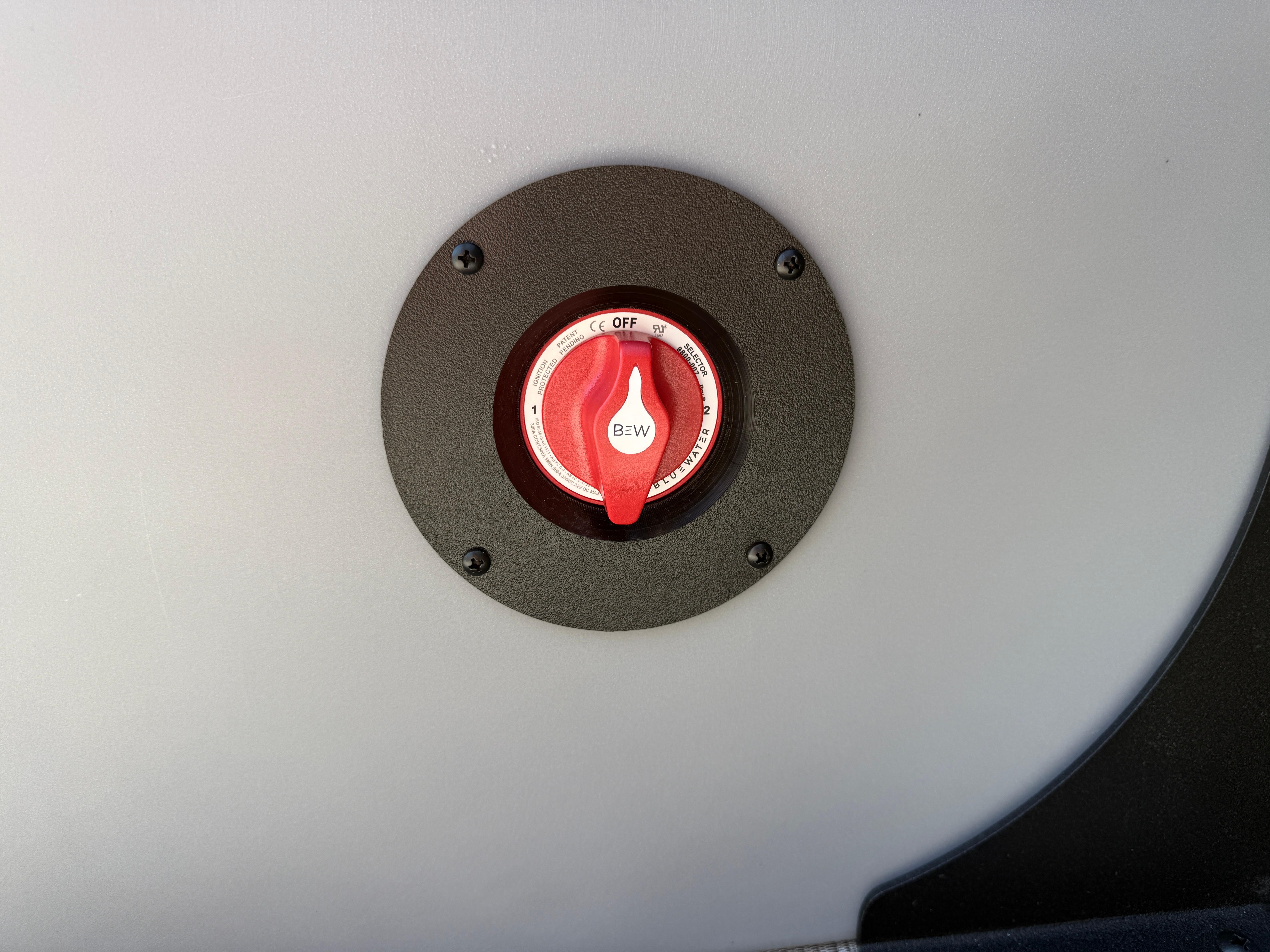 Red switch on 2026 Bentley Pontoons Legacy 223 Navigator boat panel.