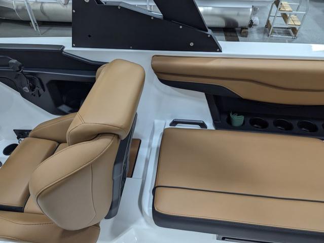 2025 Axis Wake Research T220 boat interior with tan seating and modern design.