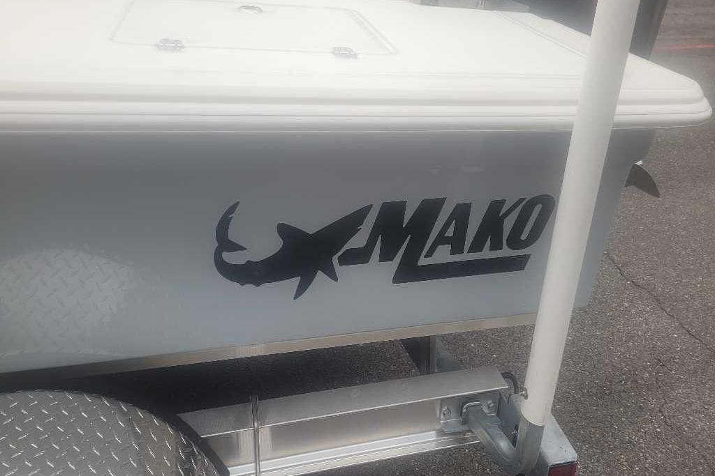 2026 Mako 18 Pro Skiff boat logo on trailer, featuring shark silhouette.