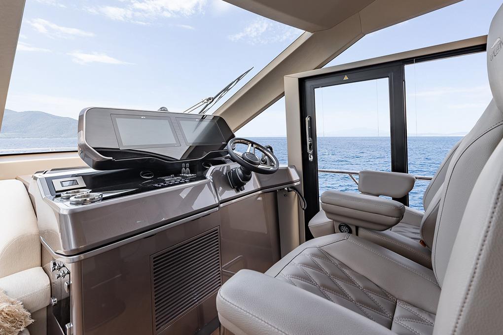 Manufacturer Provided Image: Helm of 2025 Galeon 620 FLY yacht with modern controls and ocean view.