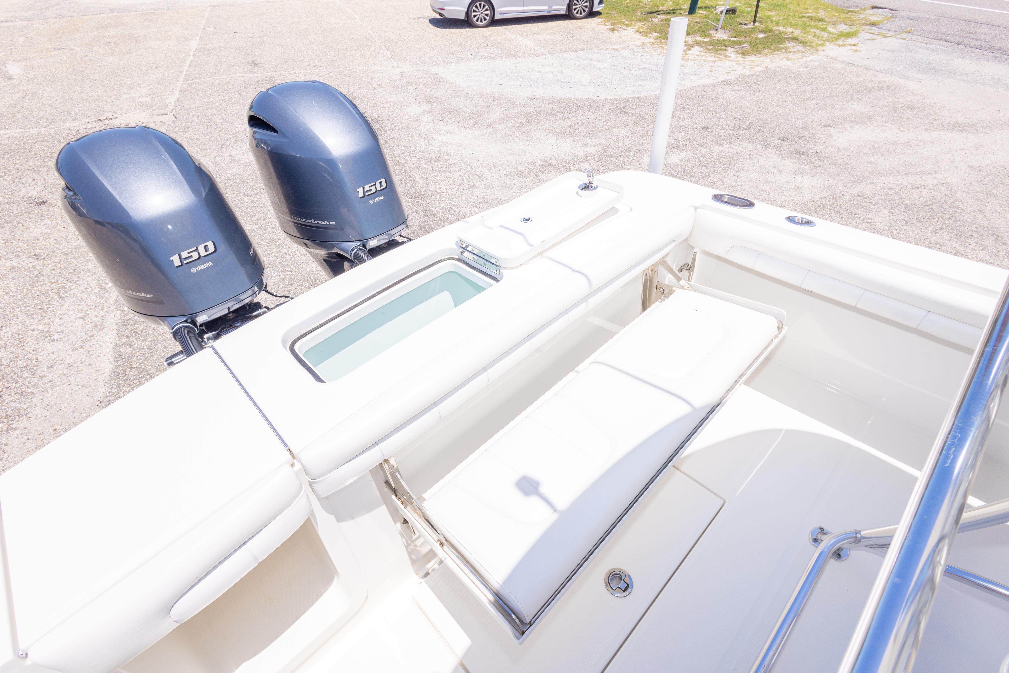2019 Regulator 23 Center Console boat with twin Yamaha 150 engines and spacious seating.