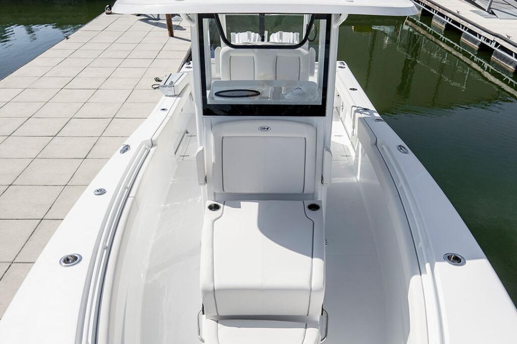 2026 Sea Hunt Gamefish 28 Coffin Box boat docked, showcasing sleek design and spacious deck.