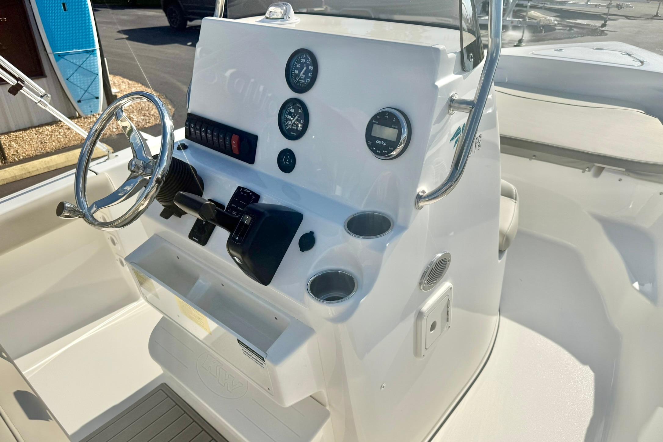 2026 Key West 189 FS boat console with steering wheel and gauges.