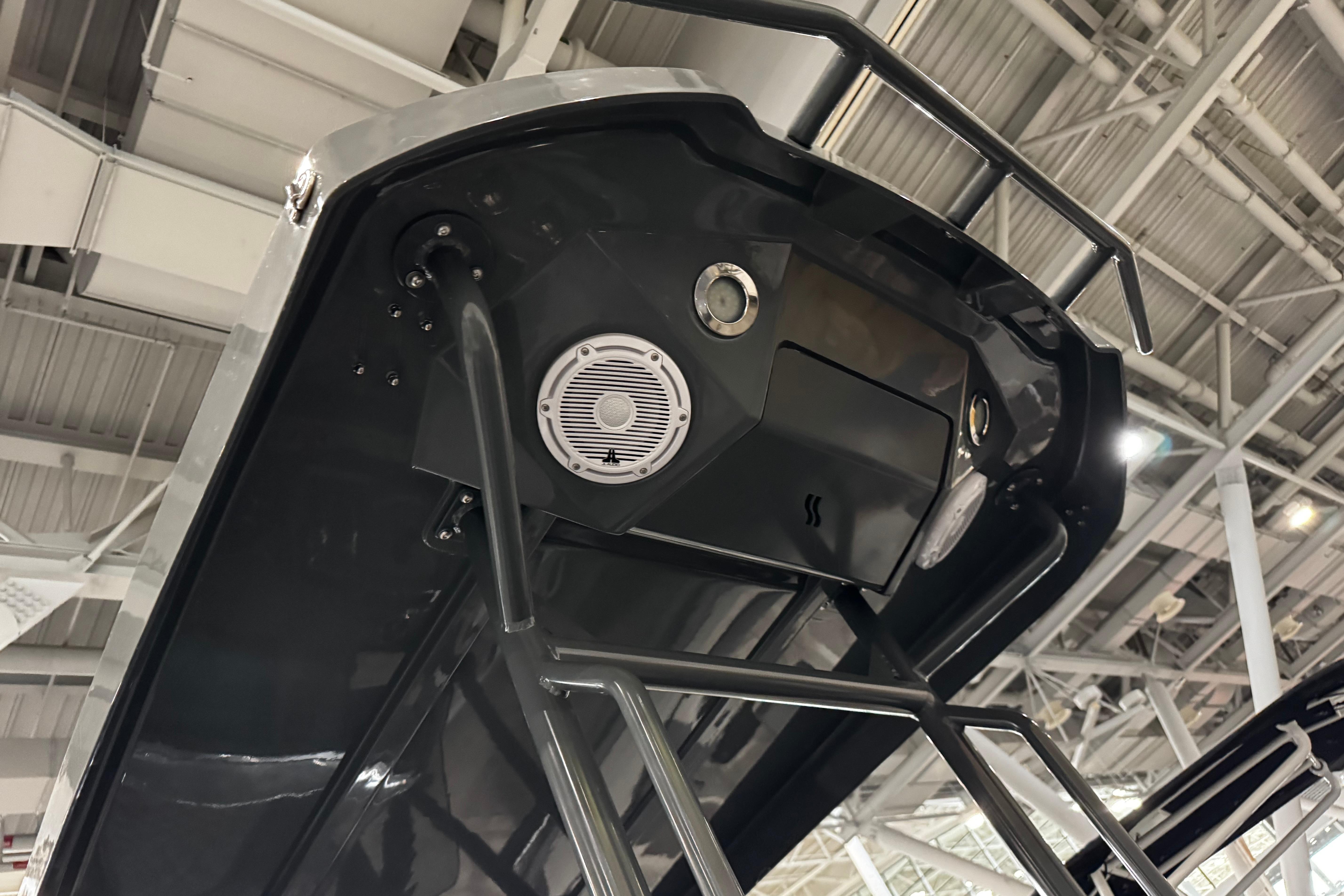2026 Highfield Sport 660 boat, underside view with speaker and railing details.