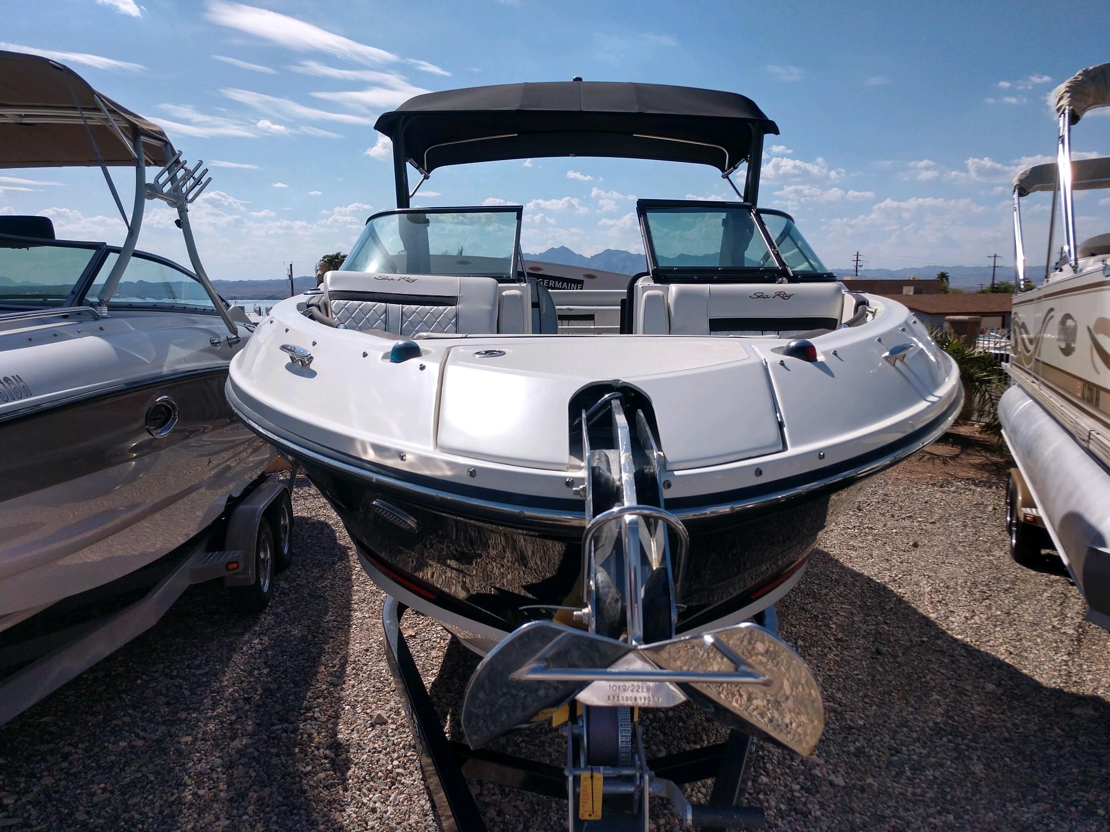 2018 Sea Ray SLX 280 boat on trailer, front view, sunny day.