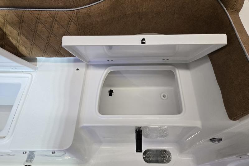 2026 Sea Hunt Ultra 275 Coffin Box interior with open storage compartment.