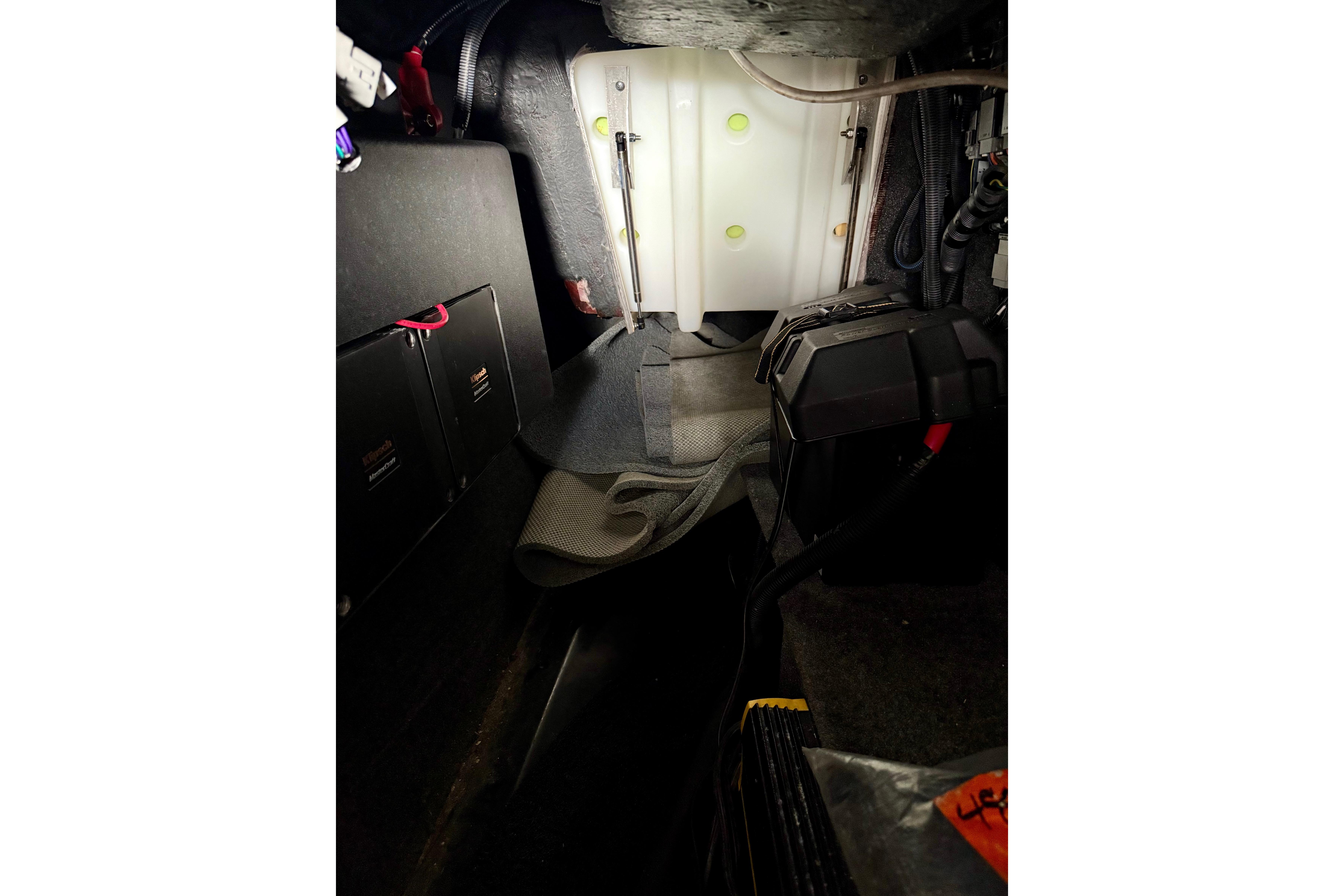 Interior view of 2023 MasterCraft X24 boat showing wiring and components.