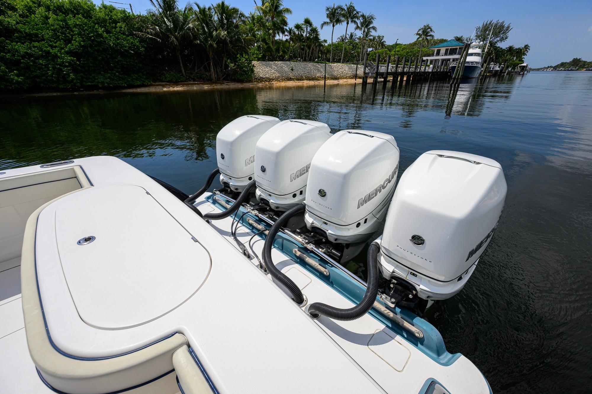 2020 Valhalla Boatworks V-41 with four Mercury outboard engines on calm water.
