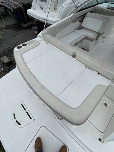 2013 Sea Ray 240 Sundeck boat interior with seating and storage compartments.