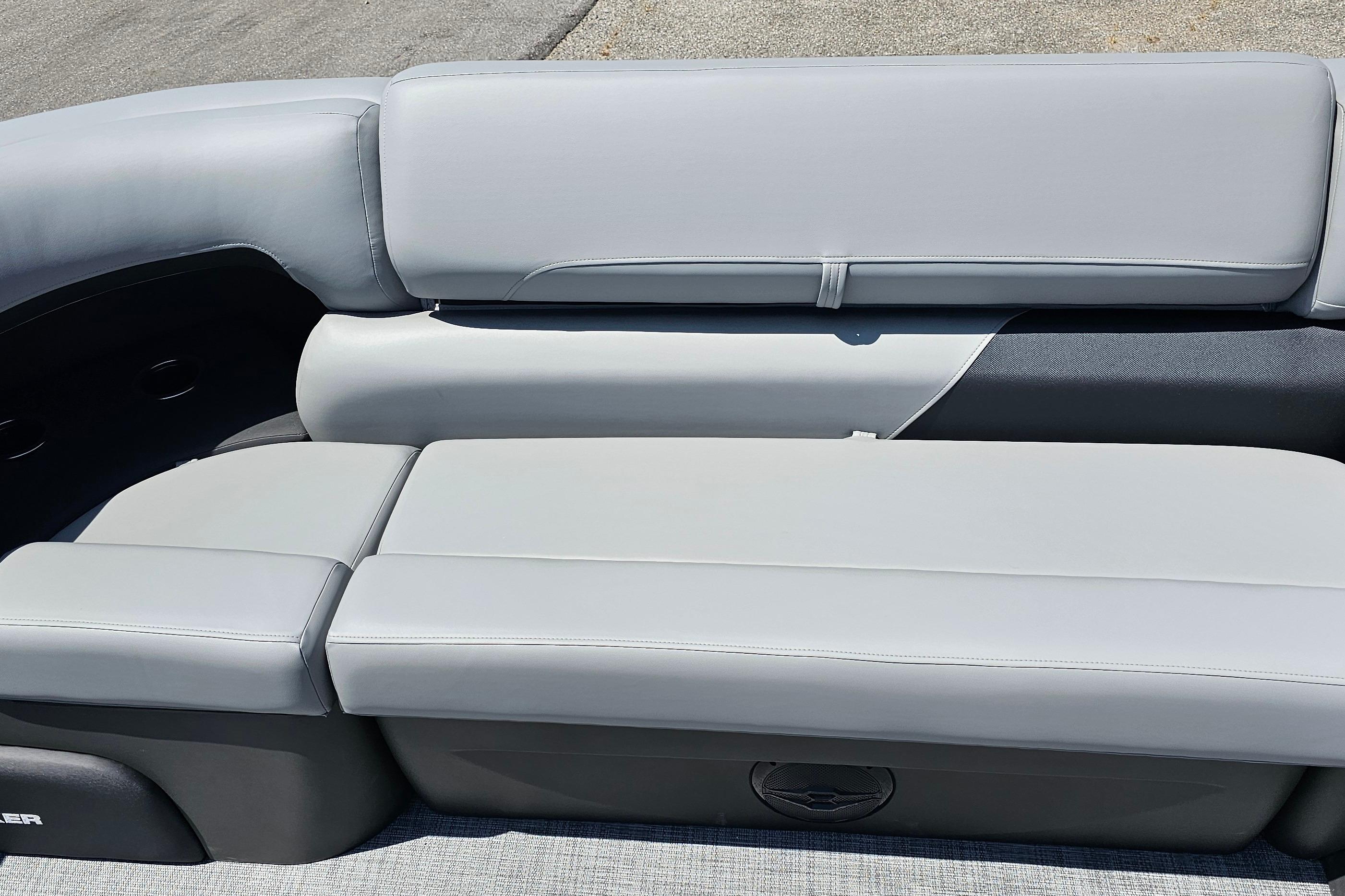 2026 Sun Tracker SportFish 20 DLX boat seating, featuring sleek gray upholstery.