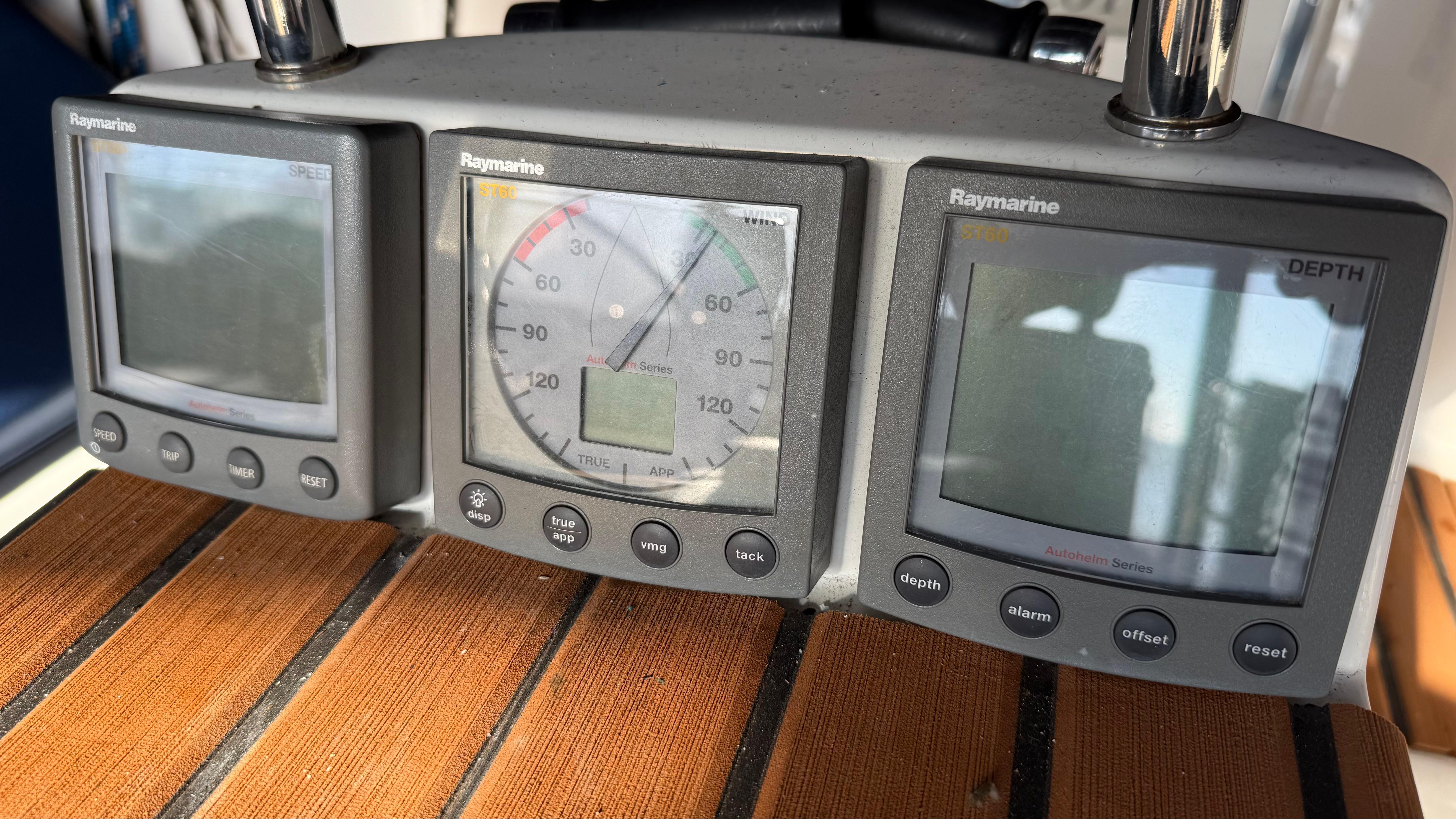Raymarine navigation instruments on a 2004 Catalina 470 yacht dashboard.