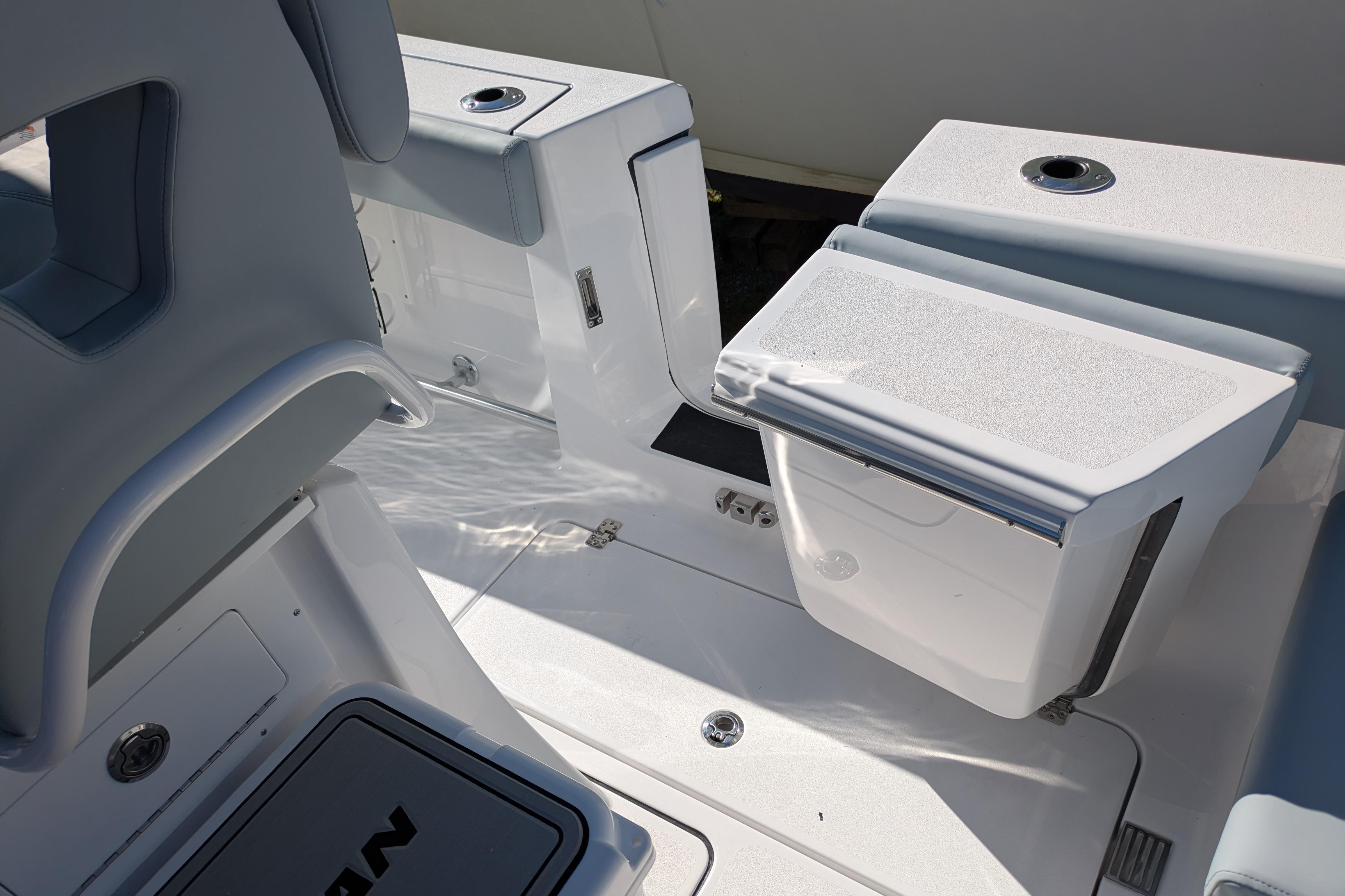 2026 Sportsman Heritage 261 Center Console boat interior with seating and storage compartments.
