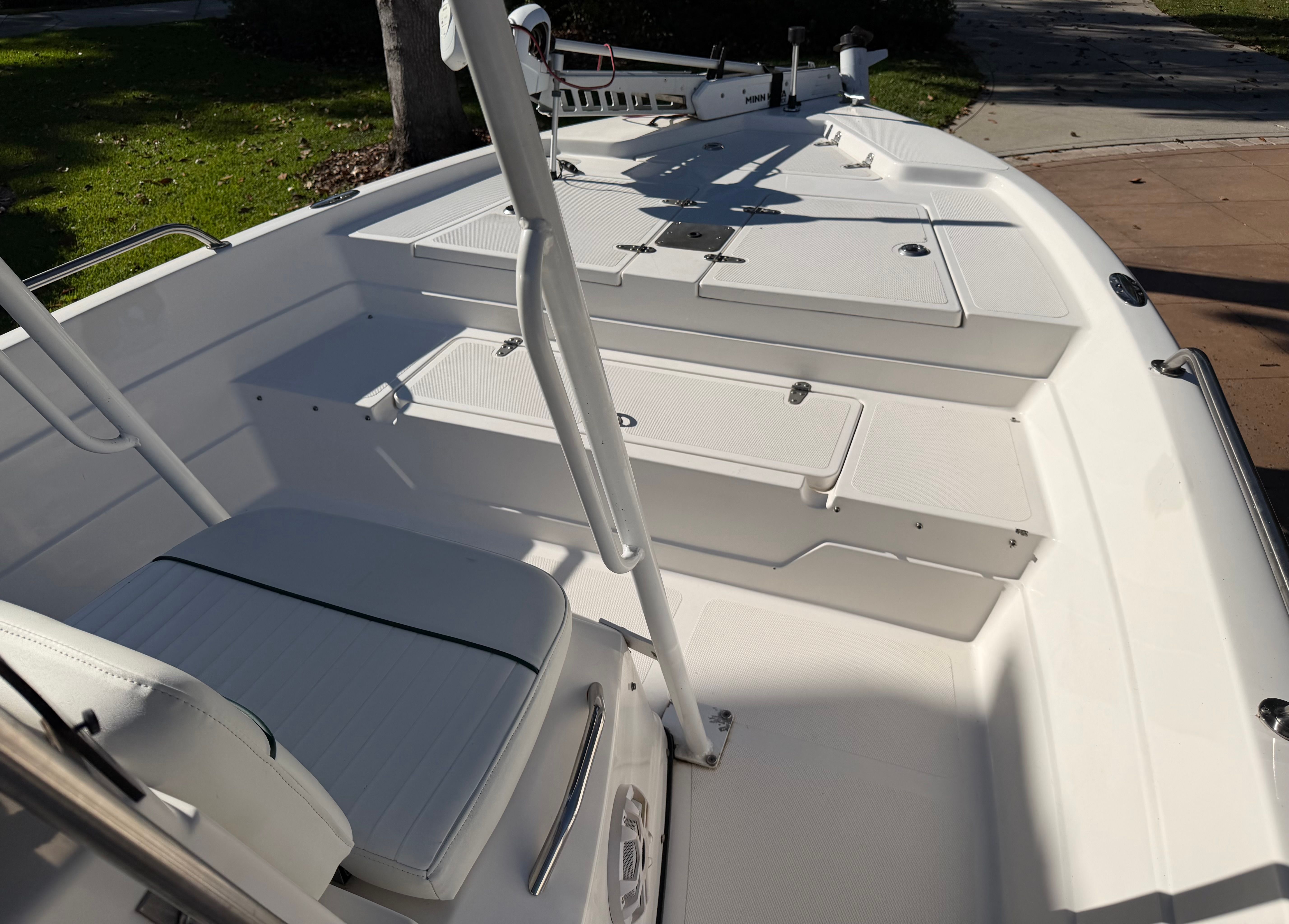 Interior view of a 1999 Skeeter ZX2200 boat with white seating.