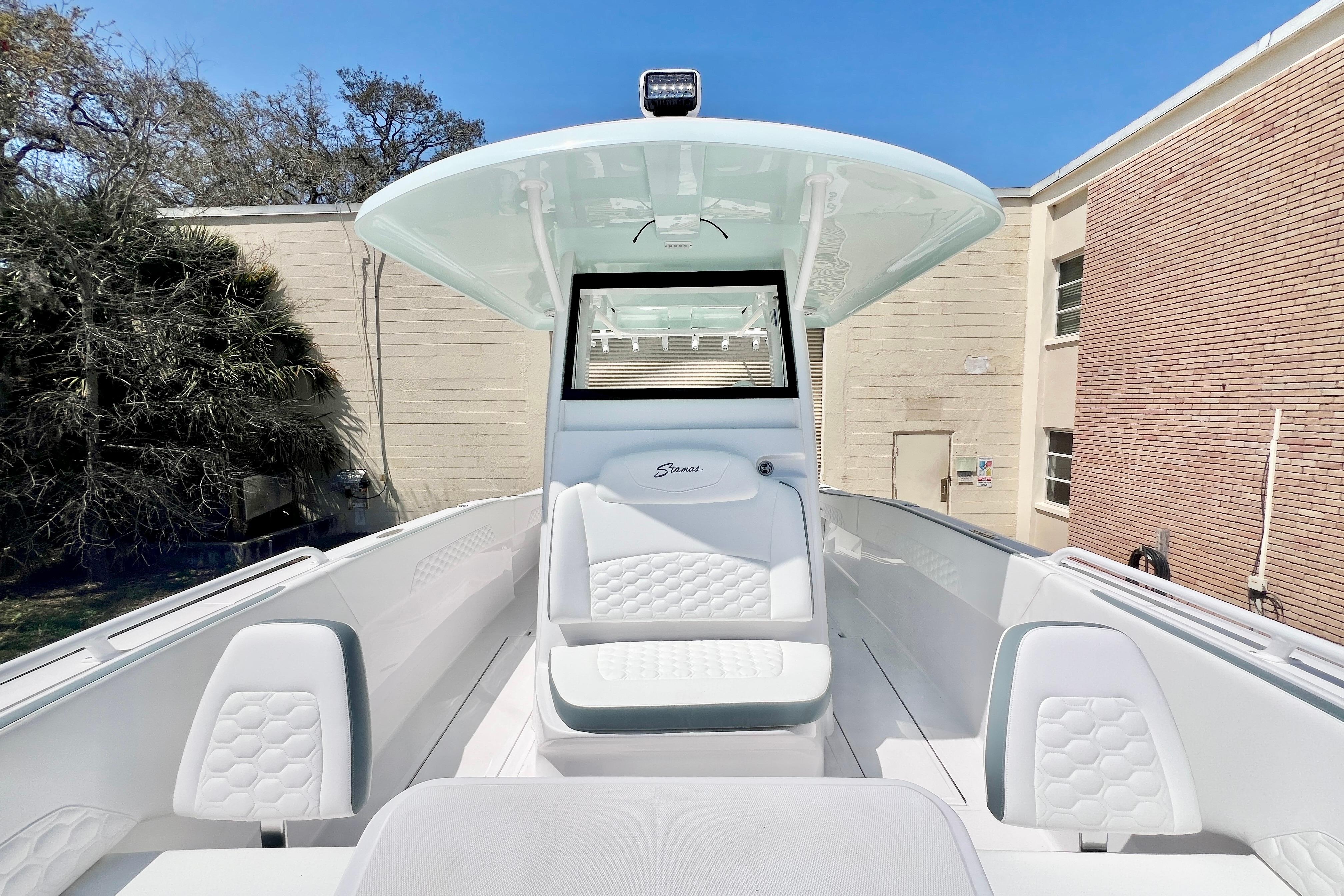 2026 Stamas 31T Aventura boat interior with modern seating and sleek design.