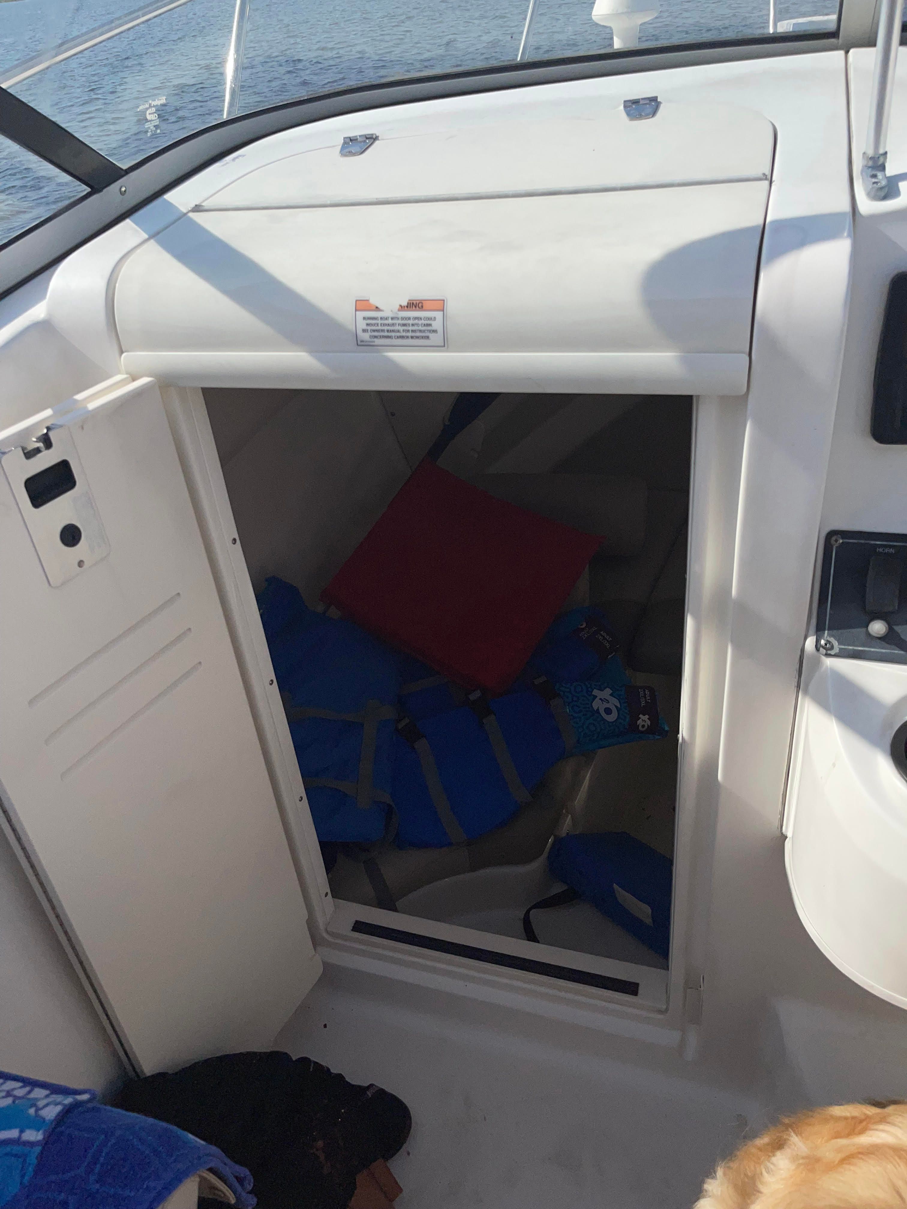 Boston Whaler 235 Conquest cabin with life jackets, 2010 model.