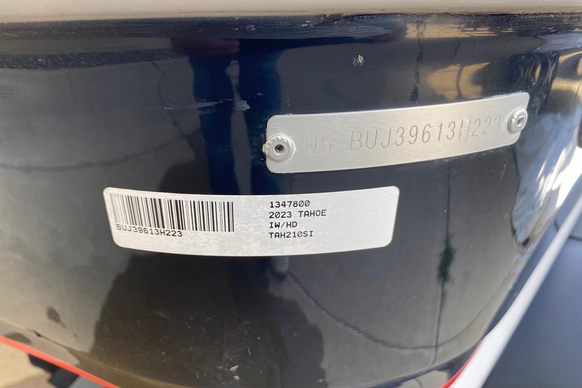 2023 Tahoe 210 Si Limited boat identification plate with serial number and barcode.