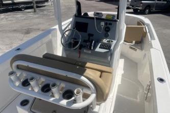 2023 Trophy T24 CC boat interior with helm, seating, and rod holders.
