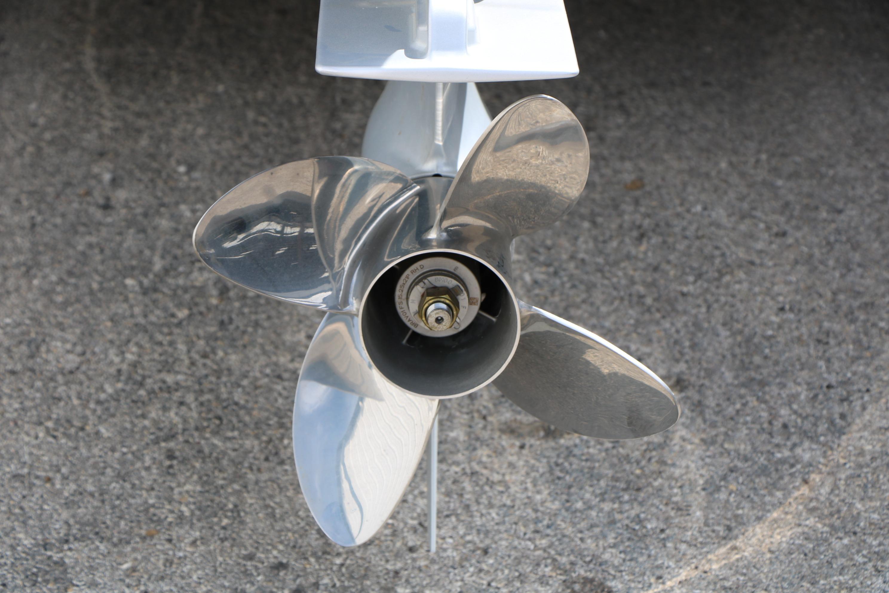 2026 Vexus AVX 1985s boat propeller on concrete surface.