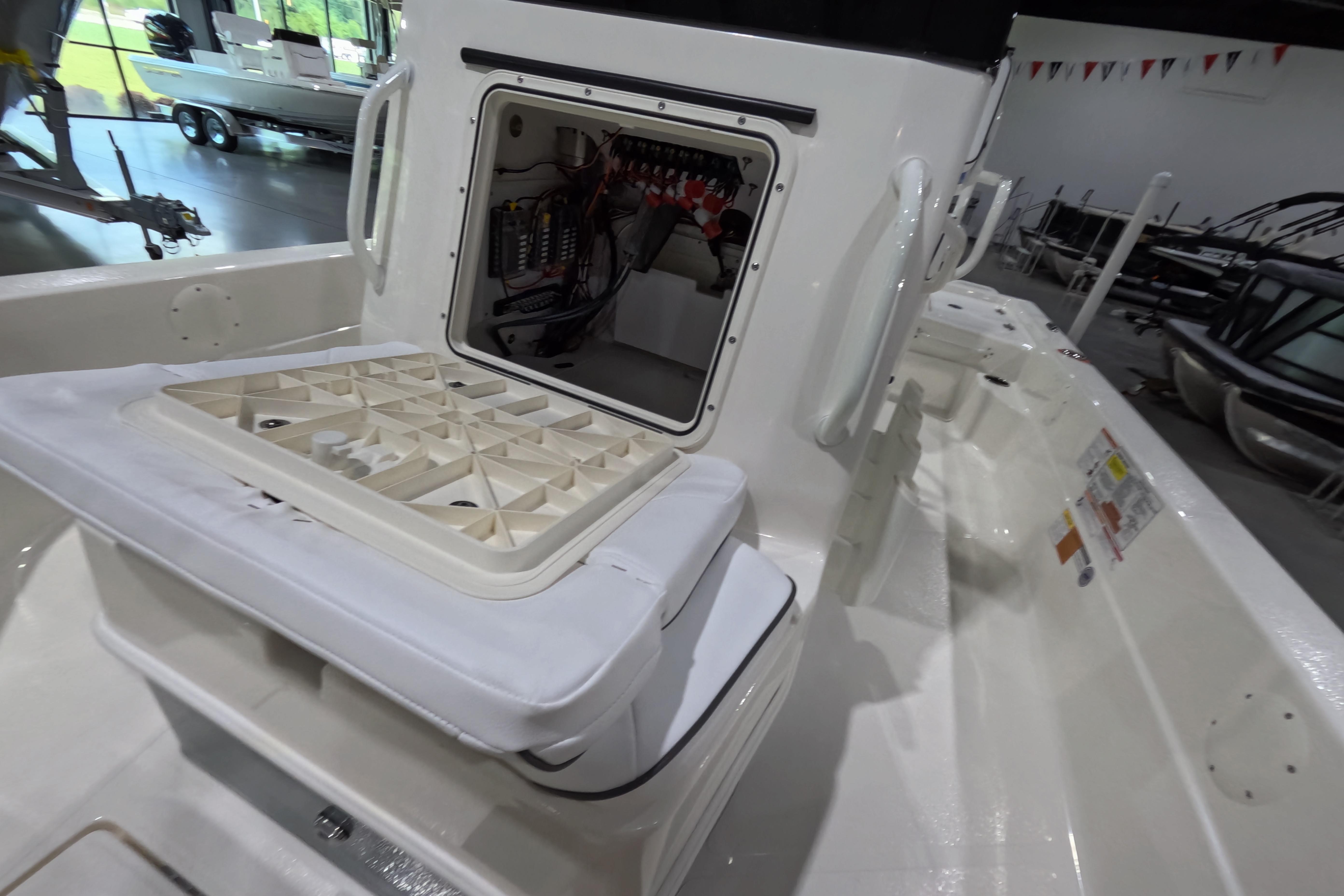 2026 Skeeter boat interior with open storage compartment and seating area.