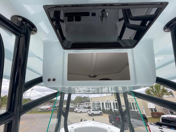 2026 Cape Horn 24XS boat console with overhead storage and sleek design.