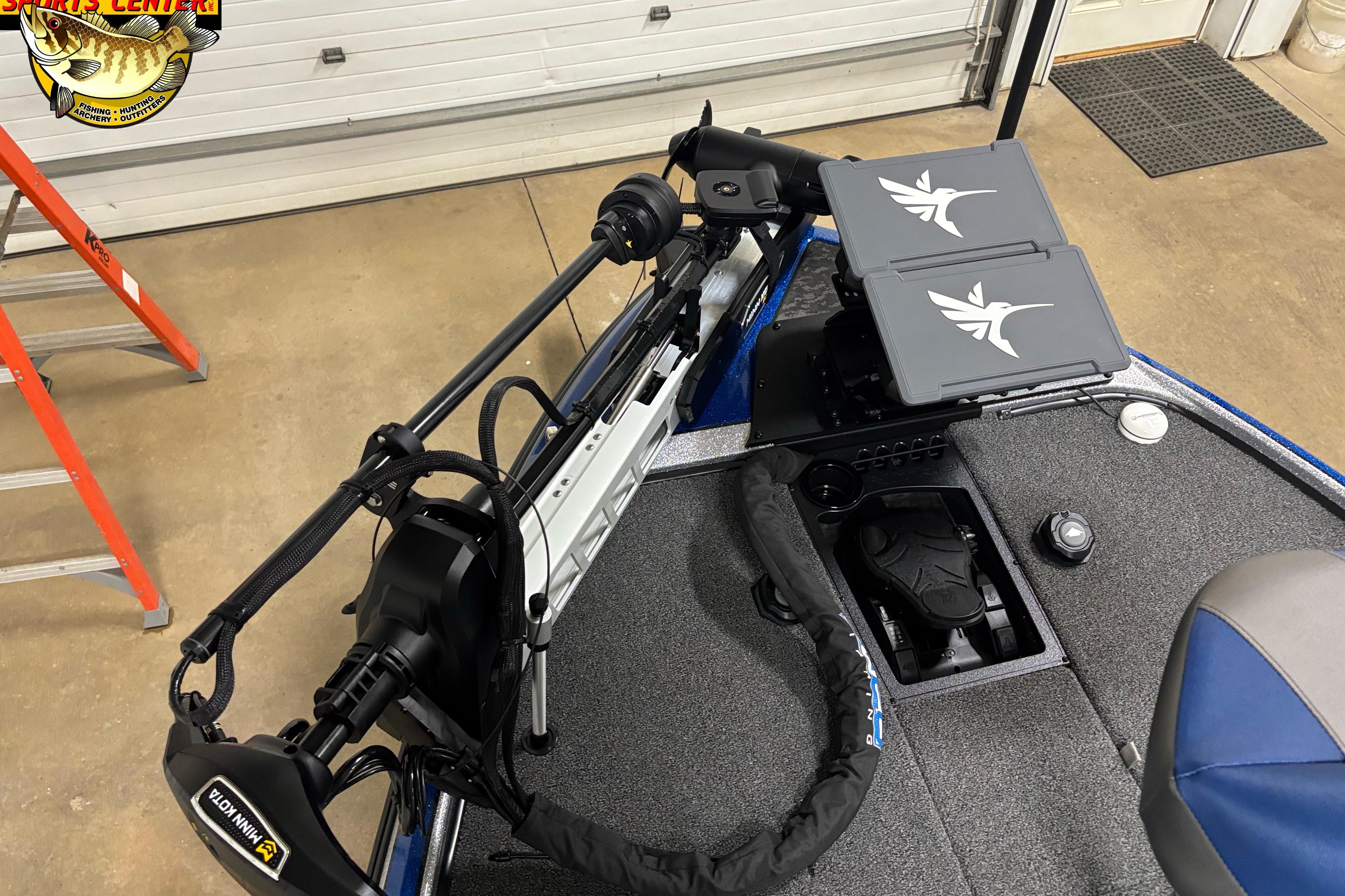 2026 Nitro Z20 XL boat with advanced trolling motor and dual fish finders in a garage setting.