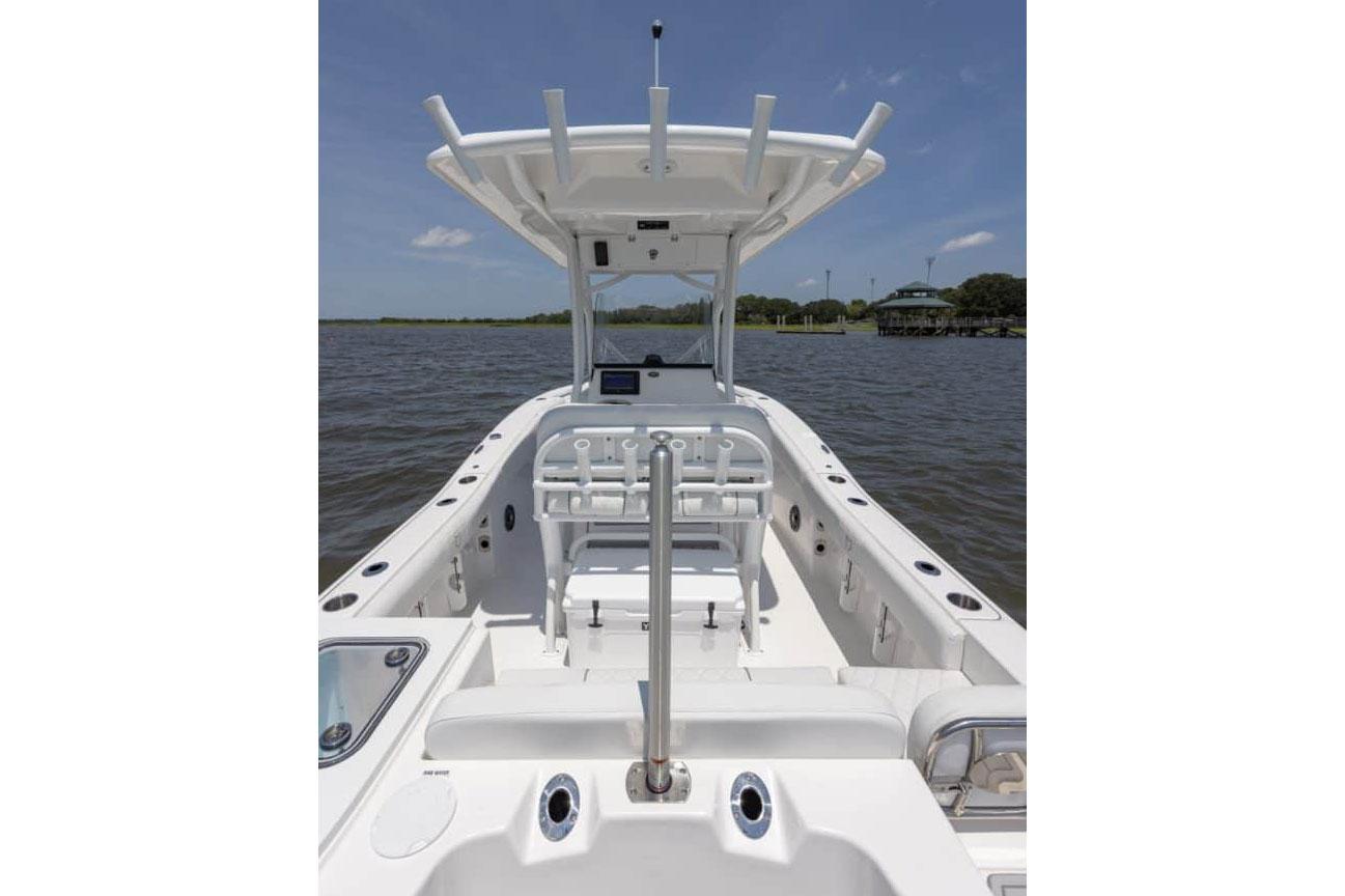 Manufacturer Provided Image: 2025 Sea Fox 228 Commander boat interior with T-top on calm water.